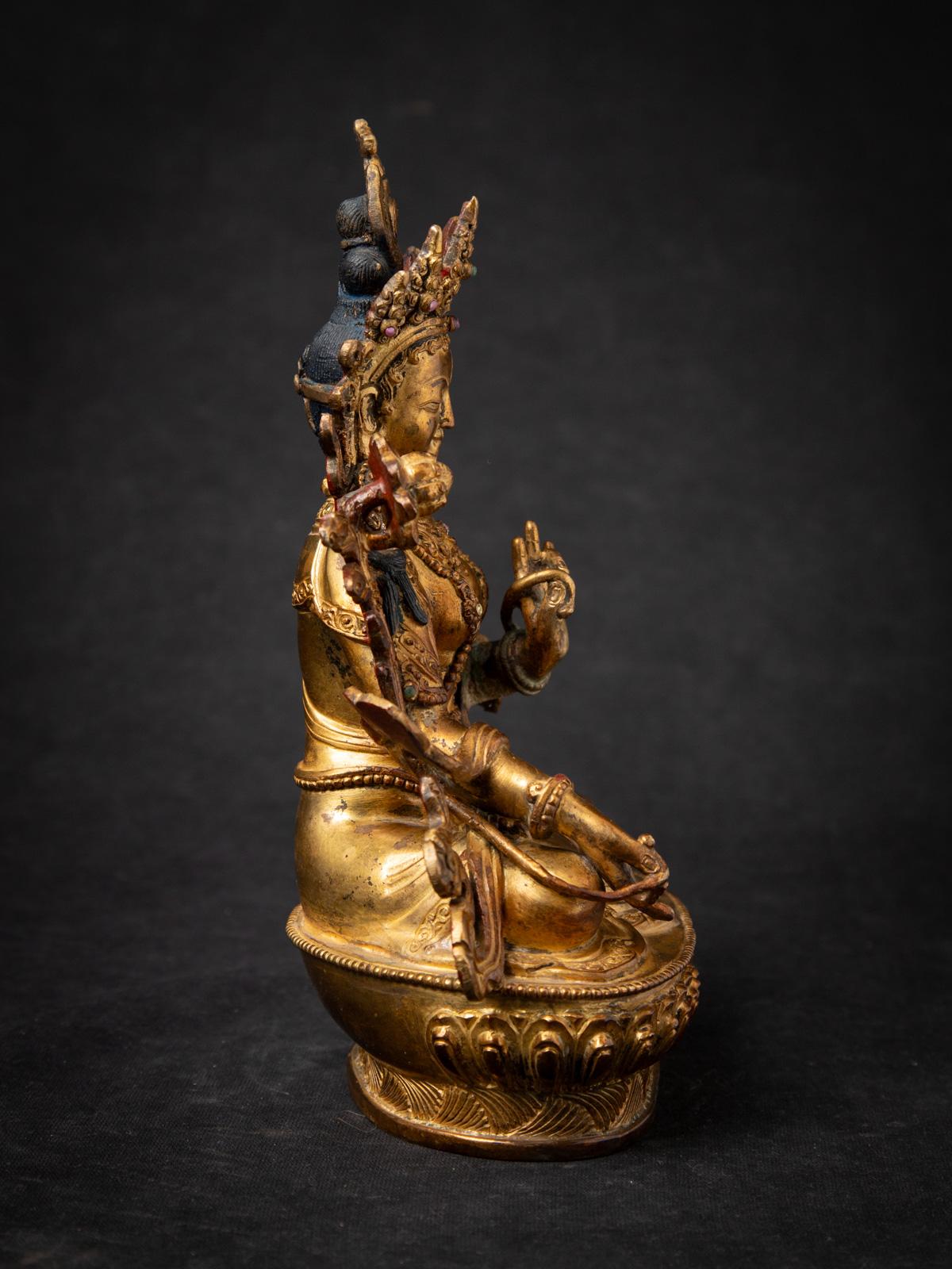 20th Century Middle 20th century Old bronze Nepali White Tara statue in Varada mudra For Sale