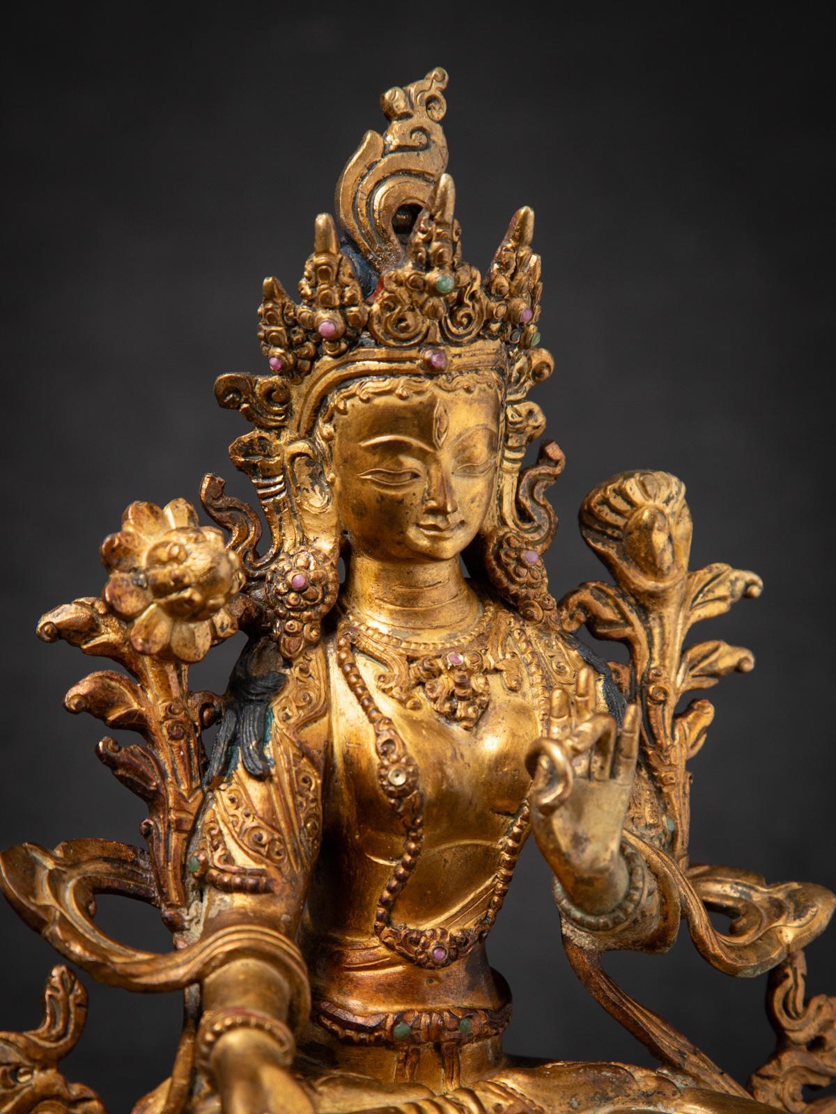 Middle 20th century Old bronze Nepali White Tara statue in Varada mudra For Sale 1