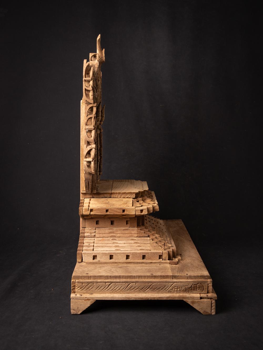 Old wooden Burmese throne

Step into a realm of timeless grandeur with this magnificent antique Burmese throne. Crafted from the finest wood and adorned, it exudes an aura of regal opulence. Standing at an impressive height of 66.2 cm, with