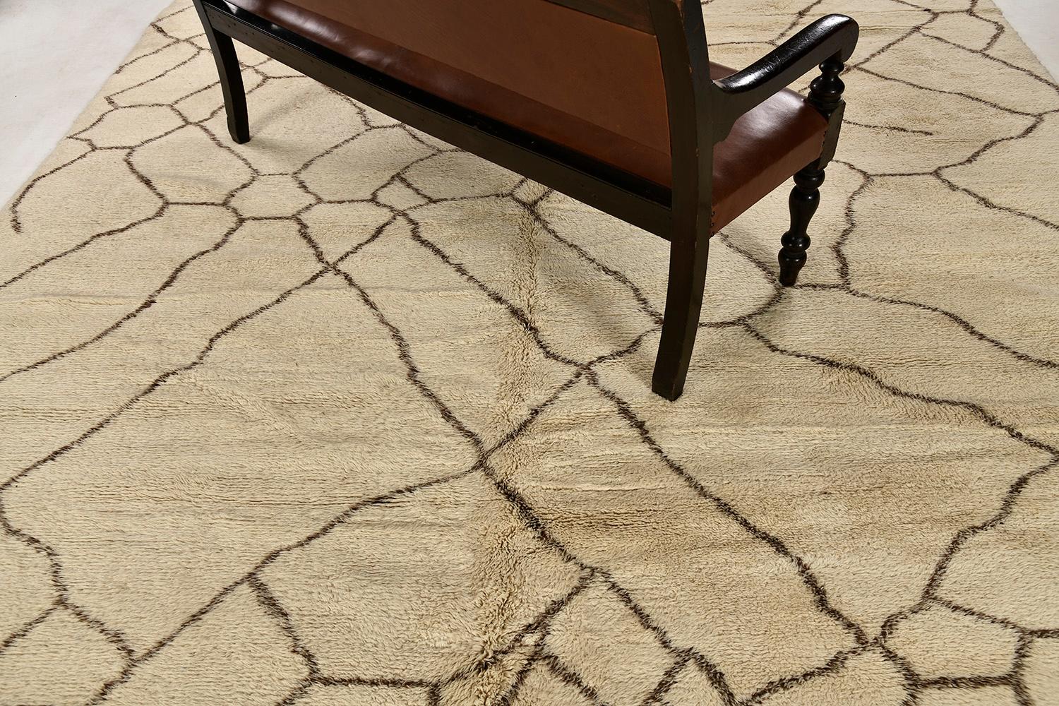 A stunning tribal rug from our Middle Atlas Collection exhibits the symbolism including recognizable linear patterns. An interesting story narrated by the skillful weavers that are open to interpretation that is knotted in shades of coffee and