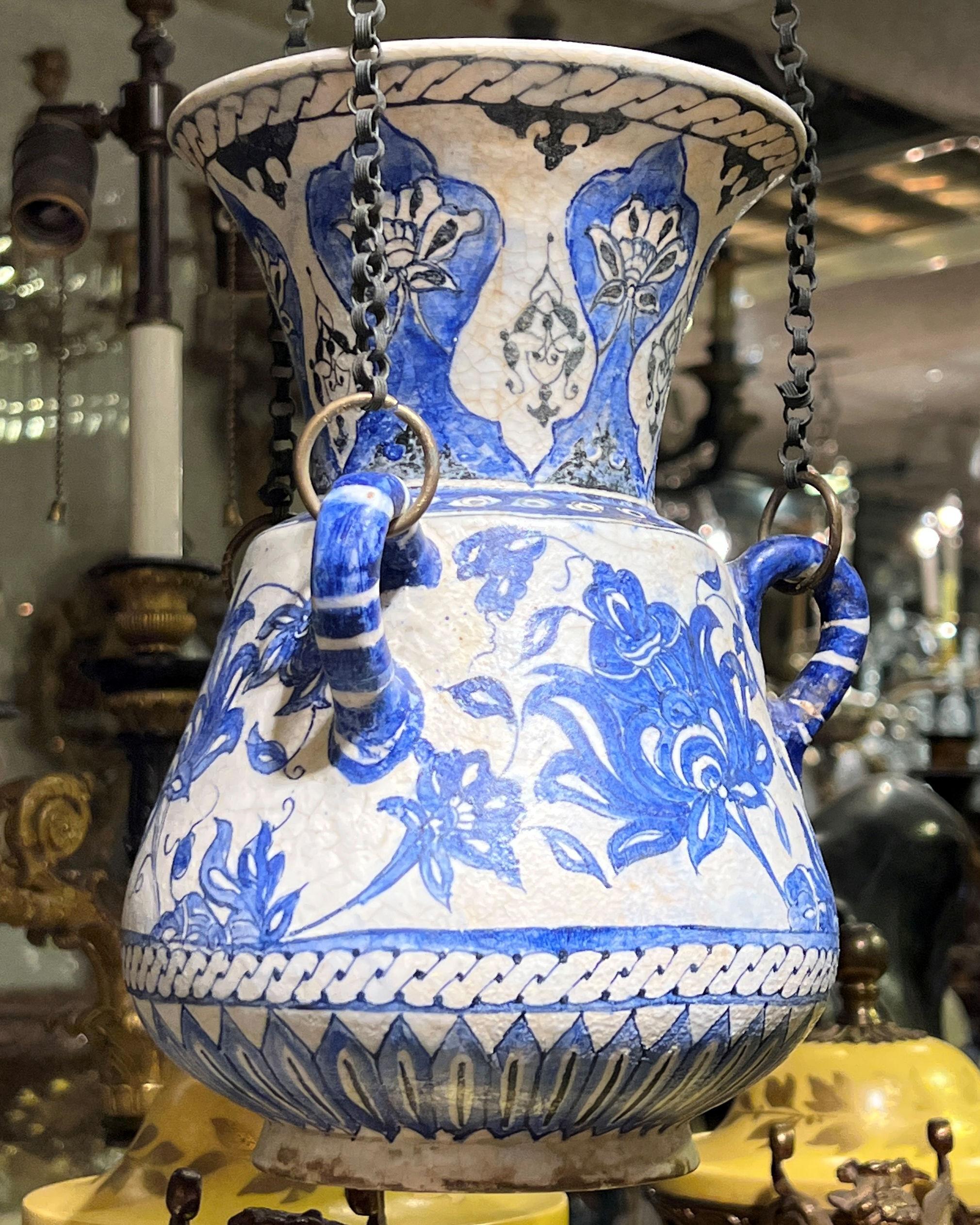 Very fine quality Middle Eastern blue and white ceramic Mosque lamp with original hardware chains.