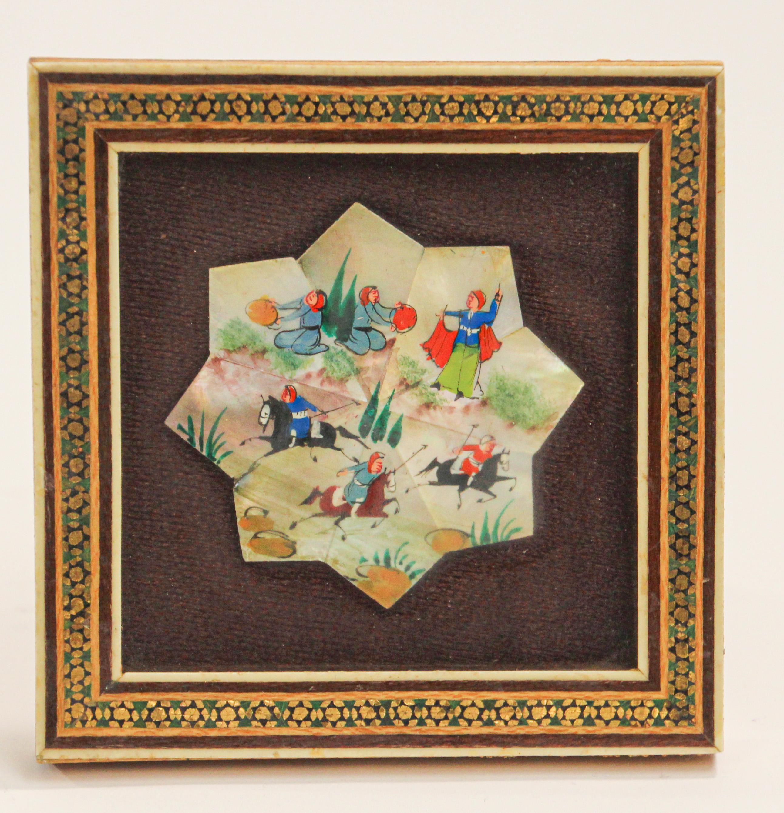 Middle Eastern miniature painting framed in a Moorish micro mosaic inlaid picture frame.
Middle Eastern Persian miniature painting on shell.
Scene of men riding horses, and dancers, very fine and colorful painting:
Intricate inlaid middle Eastern