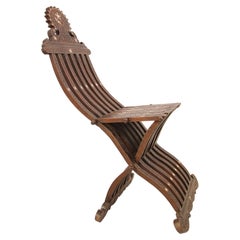 Silla plegable antigua de estilo morisco egipcio con incrustaciones de nácar, de alrededor de 1880