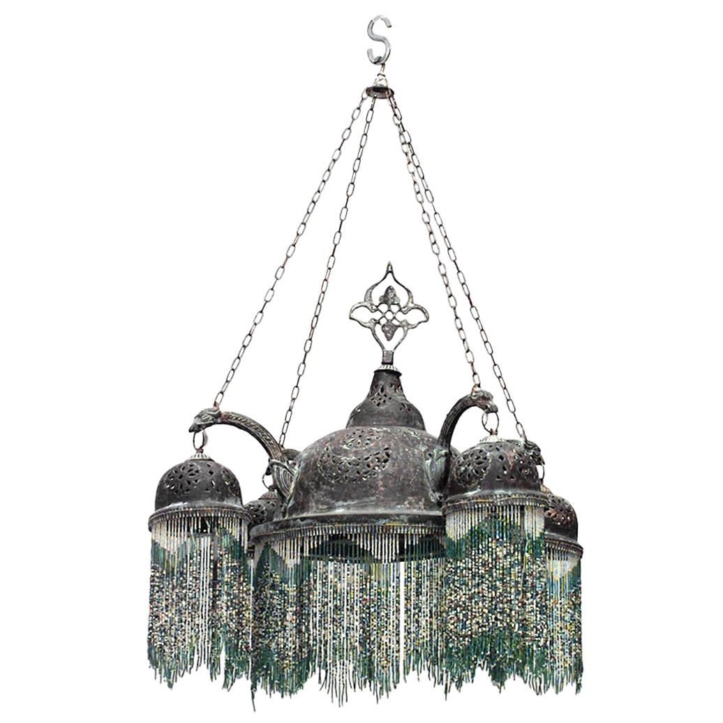 Moorish Style Patinated Brass and Green Glass Bead Chandelier For Sale
