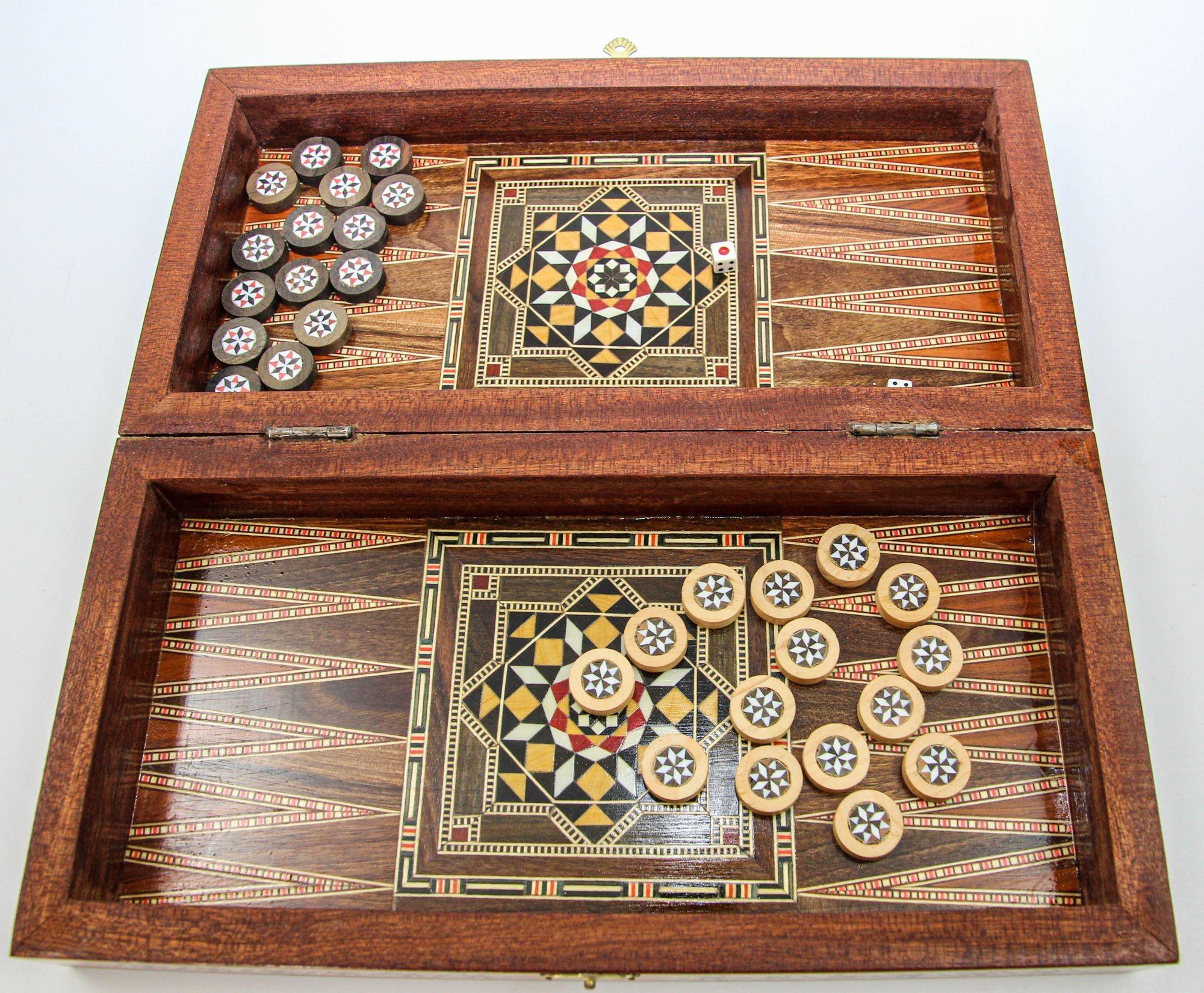 Middle Eastern Micro Mosaic Wooden Inlaid Marquetry Box Game Backgammon.
Large vintage Moorish Syrian style micro mosaic Inlay marquetry mosaic backgammon and chess game box.
Amazing craftsmanship intricate marquetry in mosaic Moorish geometric