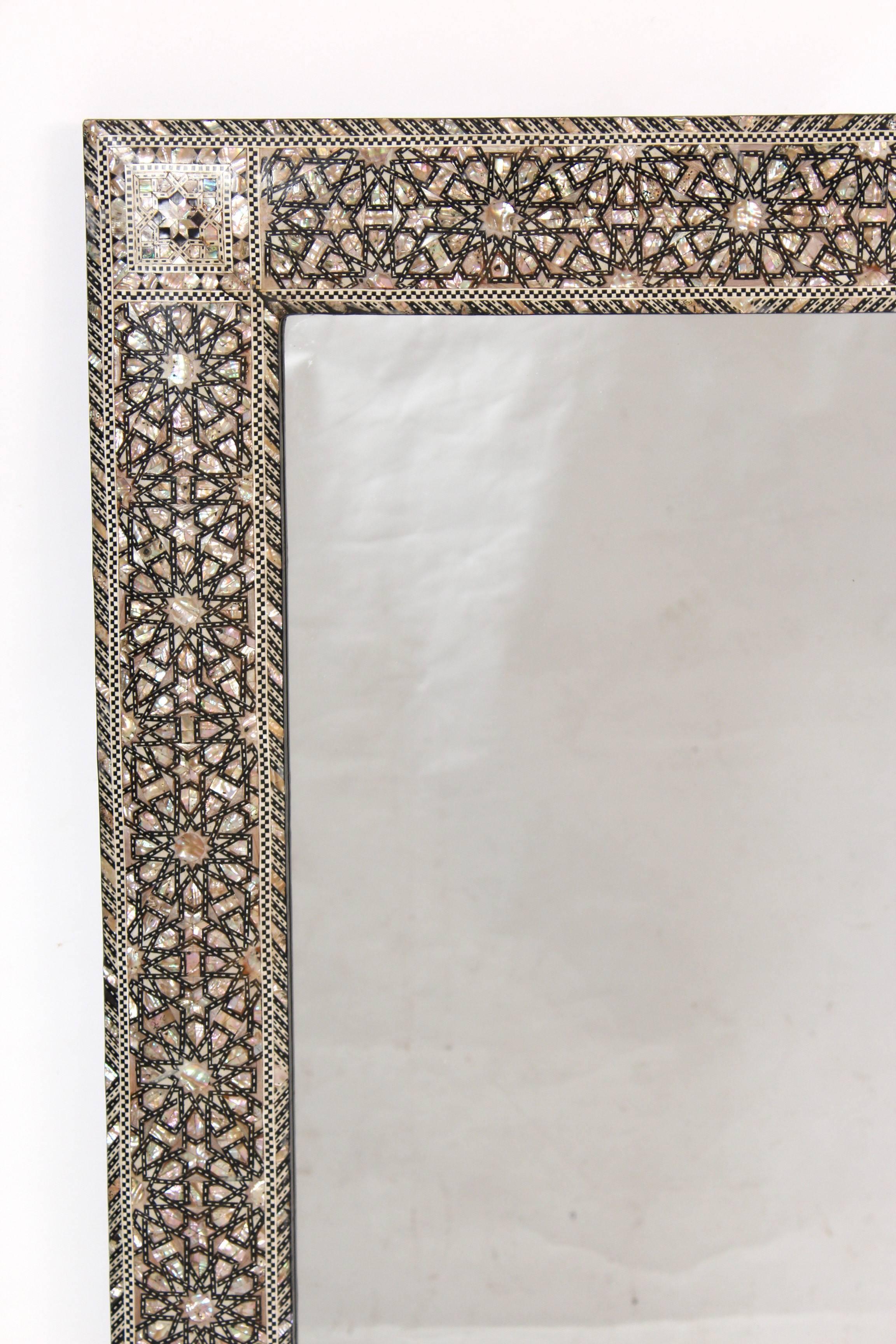 Middle Eastern mother-of-pearl and bone inlaid mirror, late 20th century.