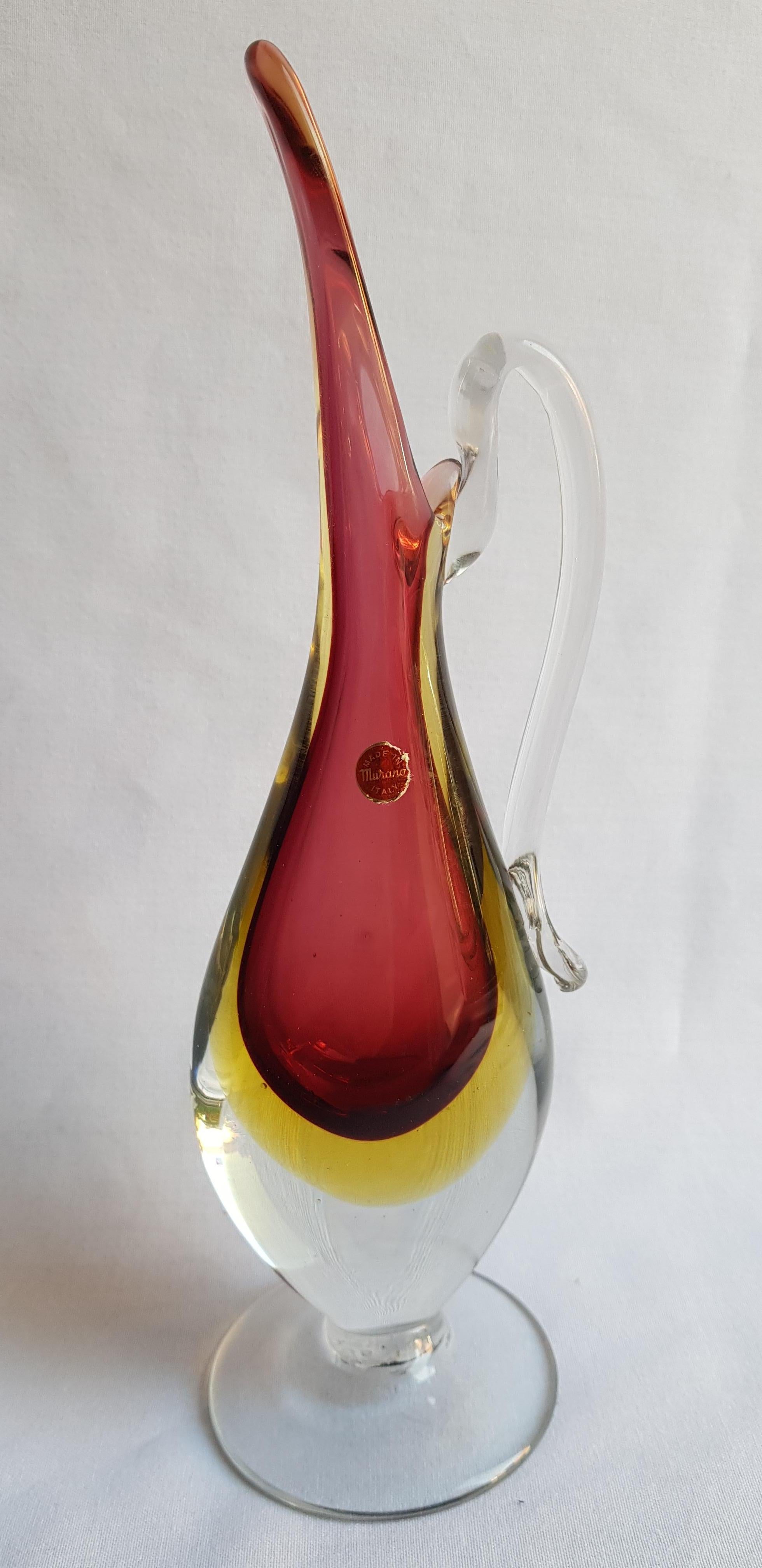 Beautiful middle  of century murano glass sommerso carafe red, yellow and clear brilliant condition beautiful home decor.