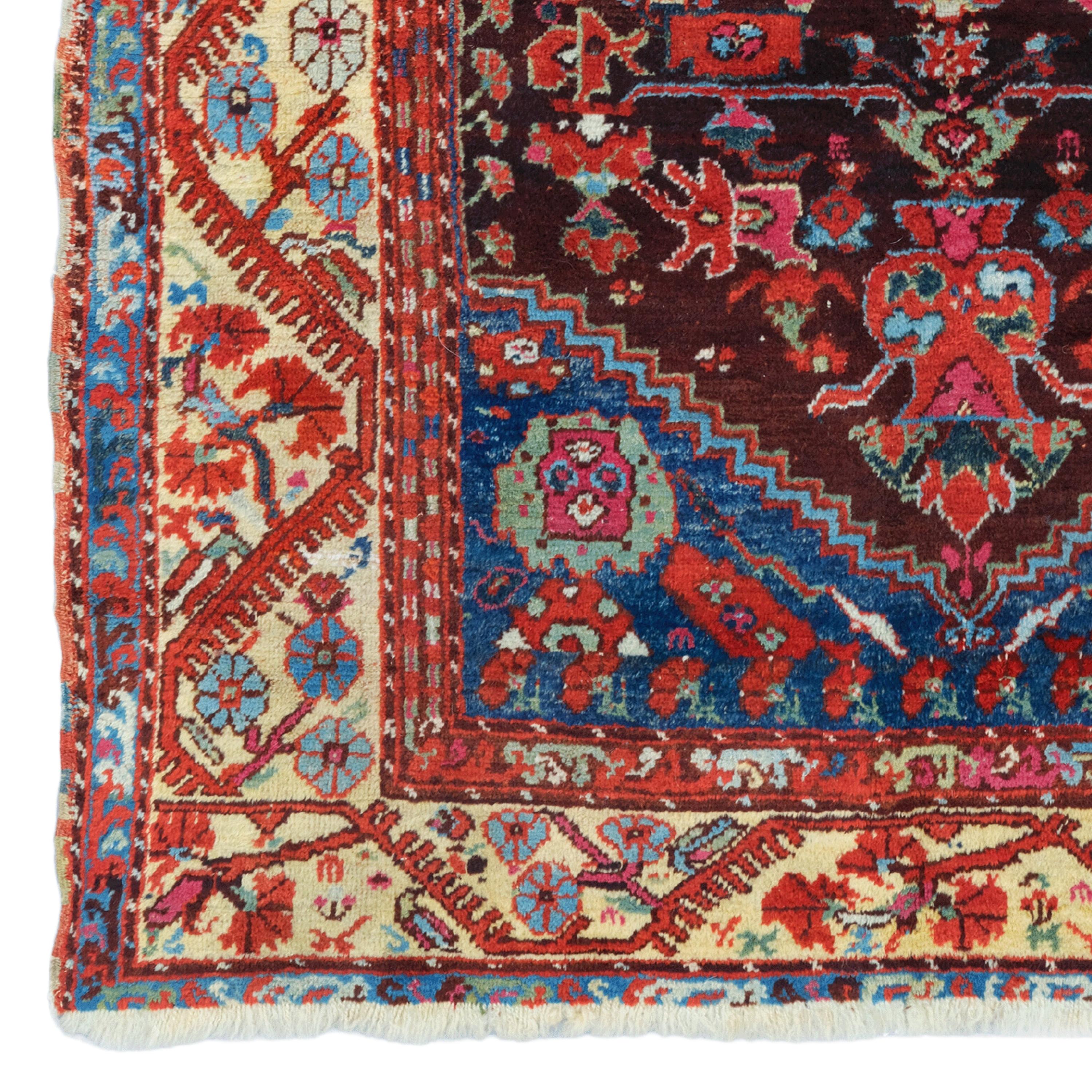 The Elegance of Traditional Texture This traditional Turkish Kula carpet is known for its rich color palette and distinctive patterns. The carpet has a large central medallion design and is surrounded by floral motifs and geometric patterns specific