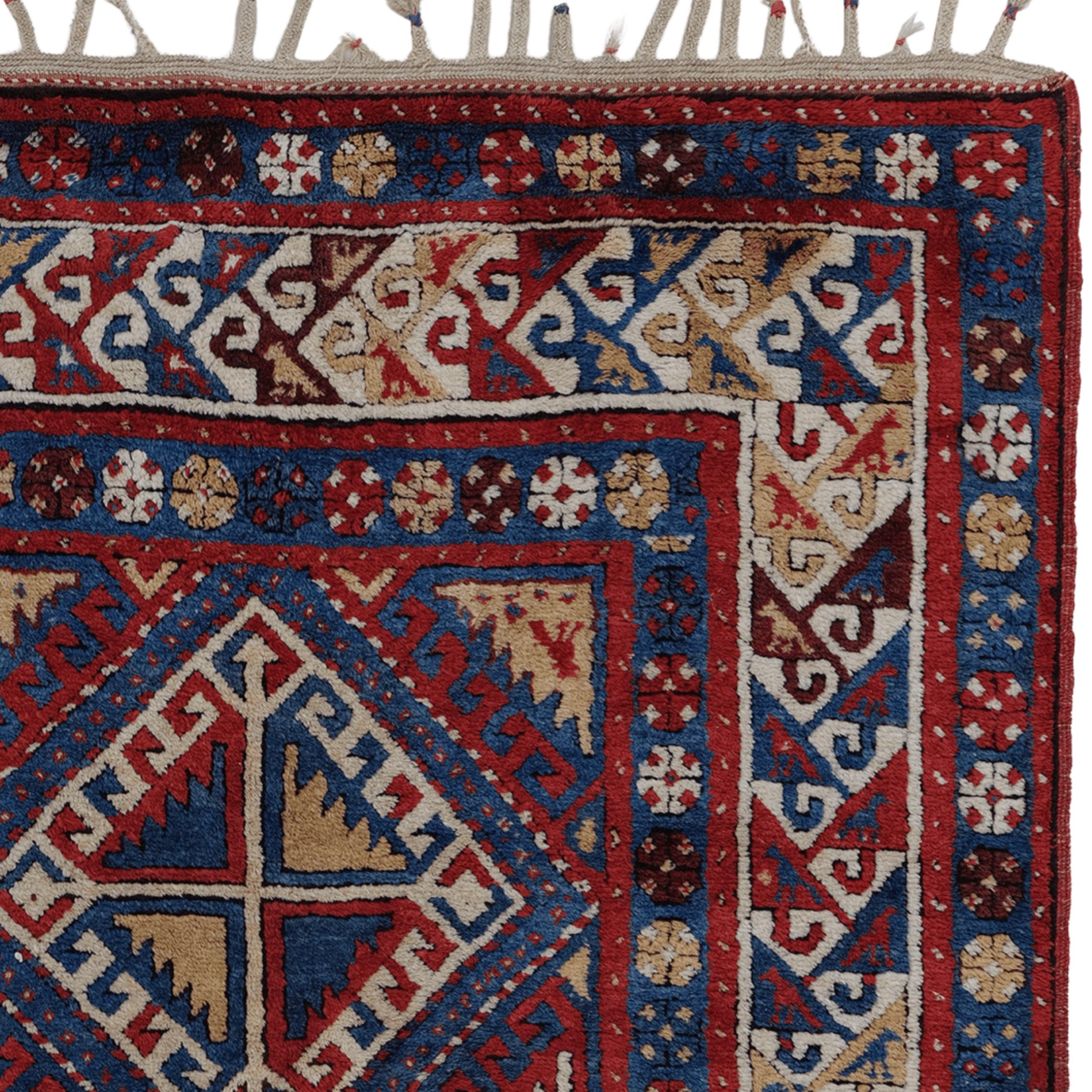 Noué à la main Tapis kazakh du milieu du 19e siècle en vente