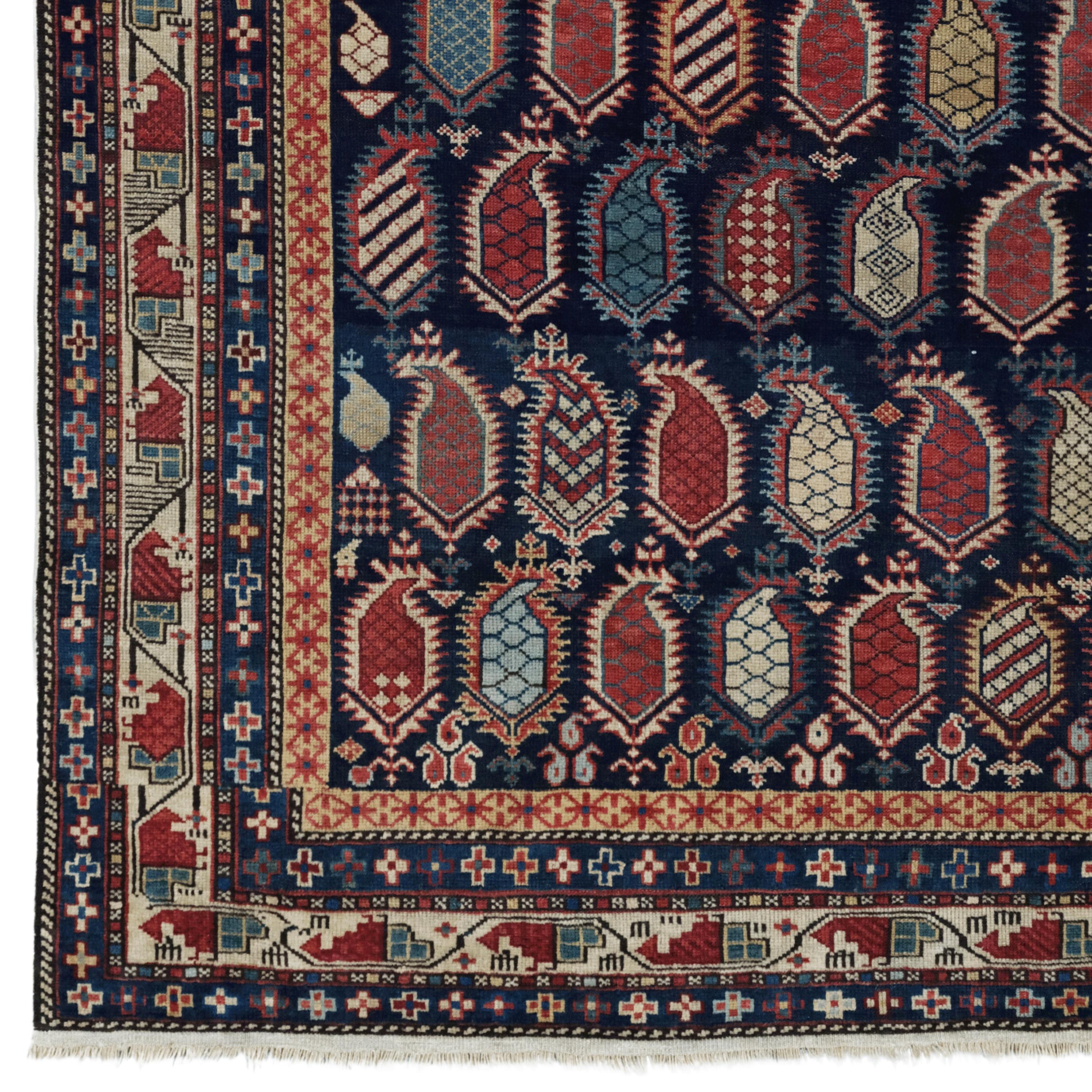 This mid-19th-century antique Caucasian Marasali carpet is both a masterpiece of textile art and a work that has survived the centuries. Fine workmanship, geometric patterns and motifs are embroidered on the fabric of this carpet. Each thread tells