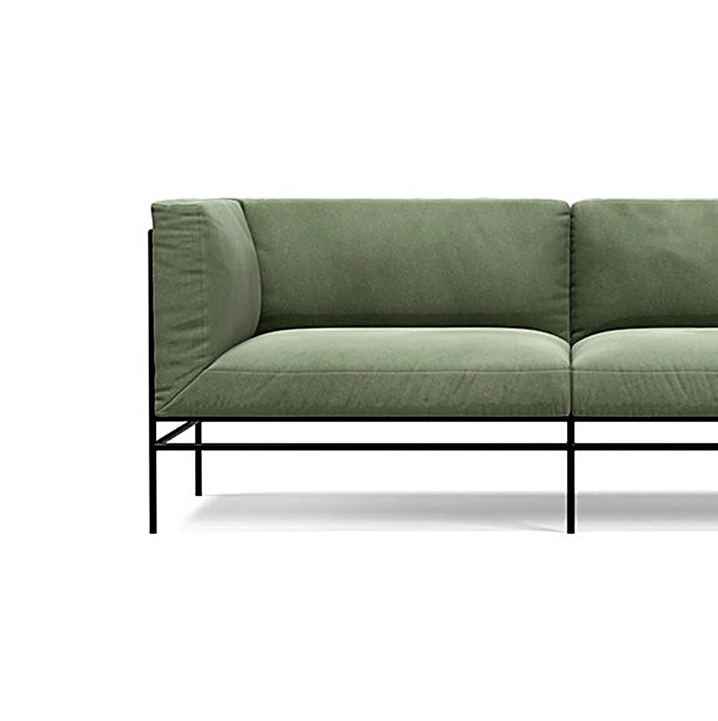 'Middleweight' two seater by Michael Anastassiades for Karakter

Middleweight is Michael Anastassiades’ very first upholstered piece of furniture. The piece captures the best of two worlds, the Italian super lounge sofa on one side and the compact
