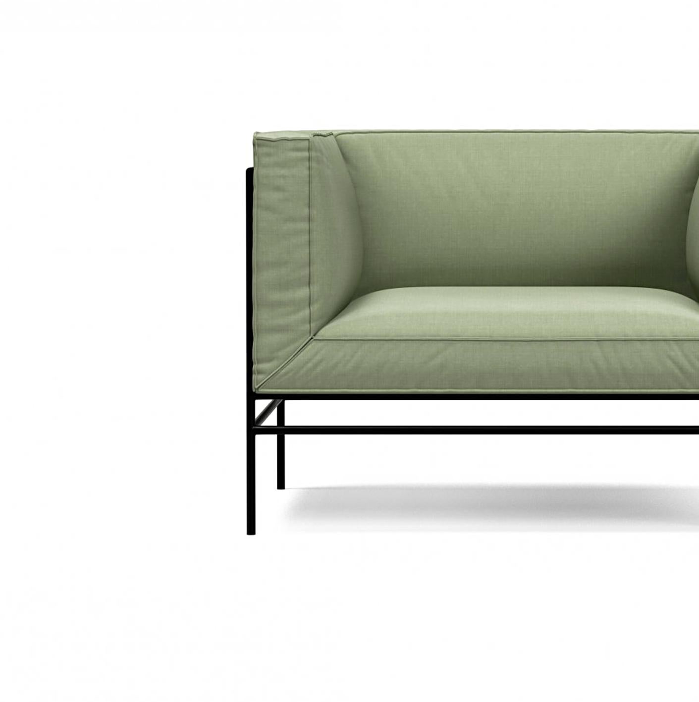 'Middleweight' armchair by Michael Anastassiades for Karakter.

Middleweight is Michael Anastassiades’ very first upholstered piece of furniture. The piece captures the best of two worlds, the Italian super lounge sofa on one side and the compact