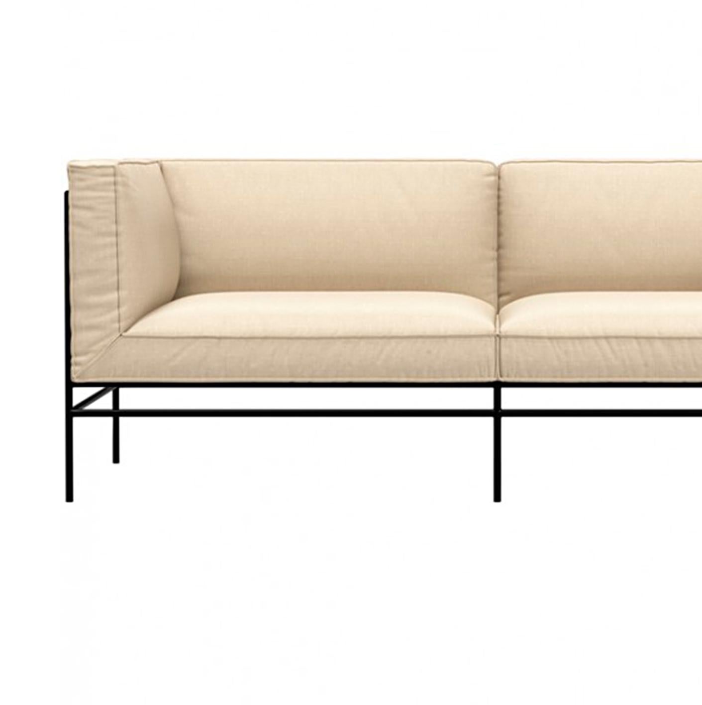'Middleweight' two seater sofa by Michael Anastassiades for Karakter

Middleweight is Michael Anastassiades’ very first upholstered piece of furniture. The piece captures the best of two worlds, the Italian super lounge sofa on one side and the