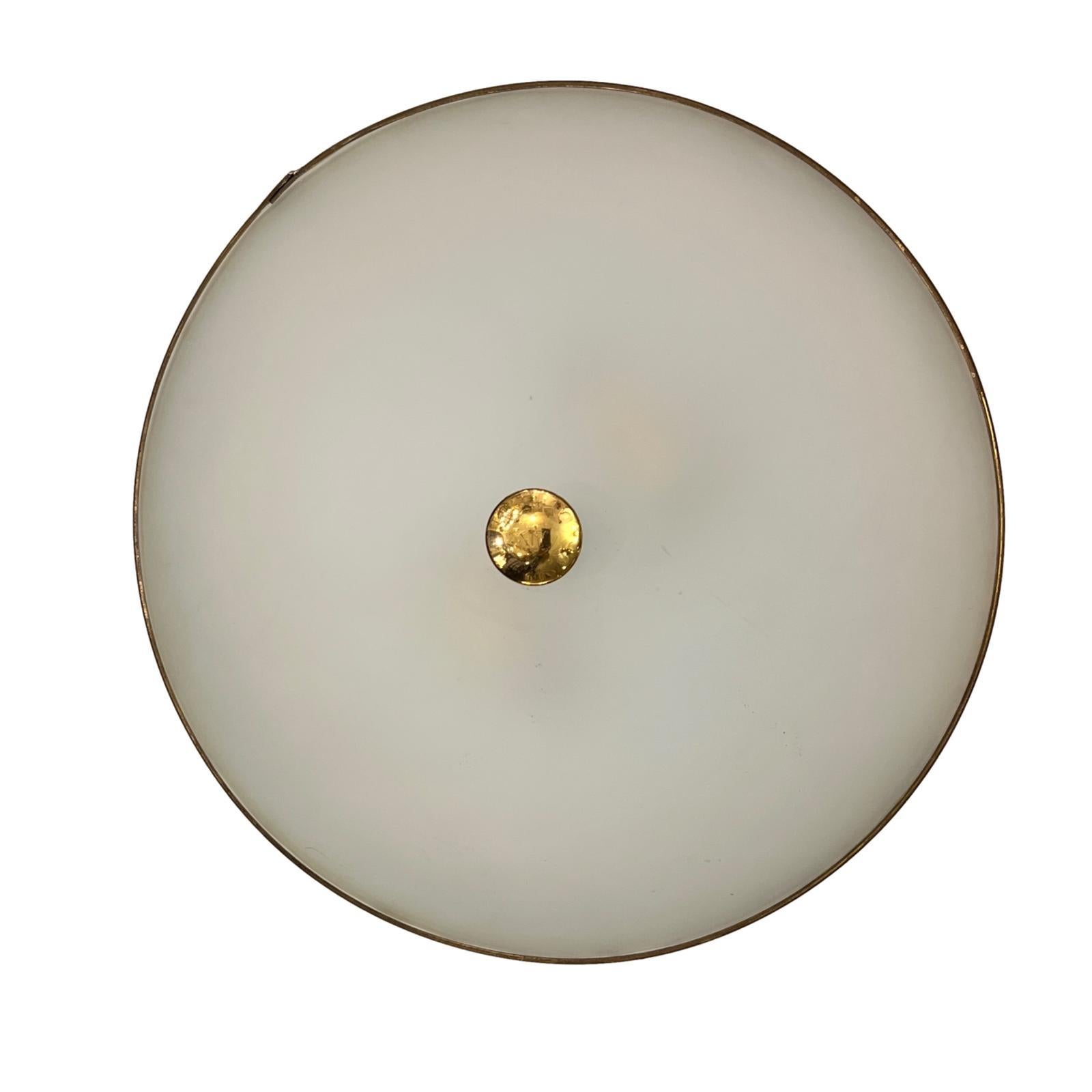 An Italian circa 1950's light fixture with frosted glass inset.

Measurements:
Drop: 5