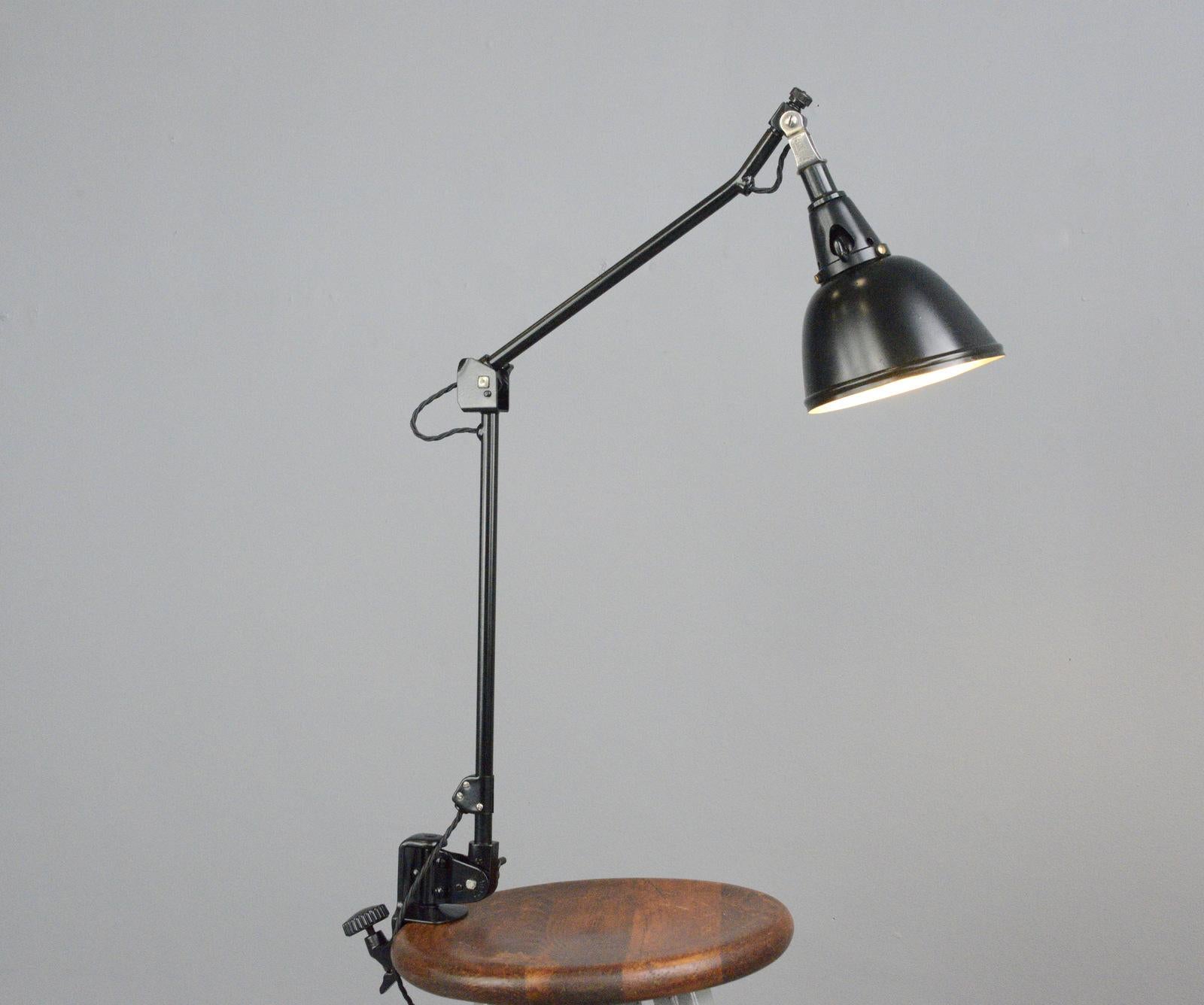 Midgard Typ 114 table lamp by Curt Fischer, circa 1930s

- Fully articulated
- Clamp on with original bakelite knob
- Aluminium shade
- Takes E27 fitting bulbs
- On/Off toggle switch on the head of the lamp
- Designed by Curt Fischer
-