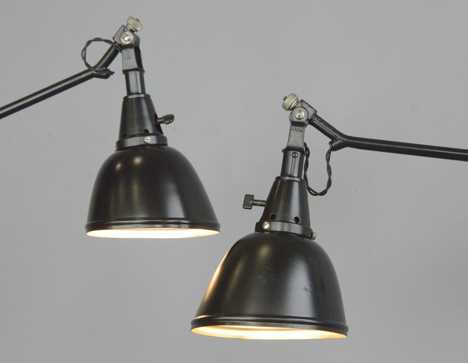 Midgard Typ 114 table lamps by Curt Fischer, circa 1930s

- Price is per lamp
- Fully articulated
- Clamp on with original Bakelite knob
- Aluminium shade
- Takes E27 fitting bulbs
- On/Off toggle switch on the head of the lamp
- Designed by