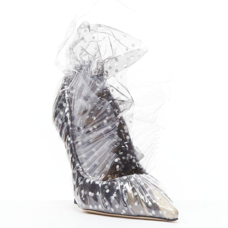 MIDNIGHT 00 black white polka dot tulle PVC frill ruffle pump EU38
Reference: MELK/A00224
Brand: Midnight 00
Material: Plastic
Color: Black, White
Pattern: Polka Dot
Lining:  Leather
Made in: Italy

CONDITION:
Condition: Unworn in mint condition,