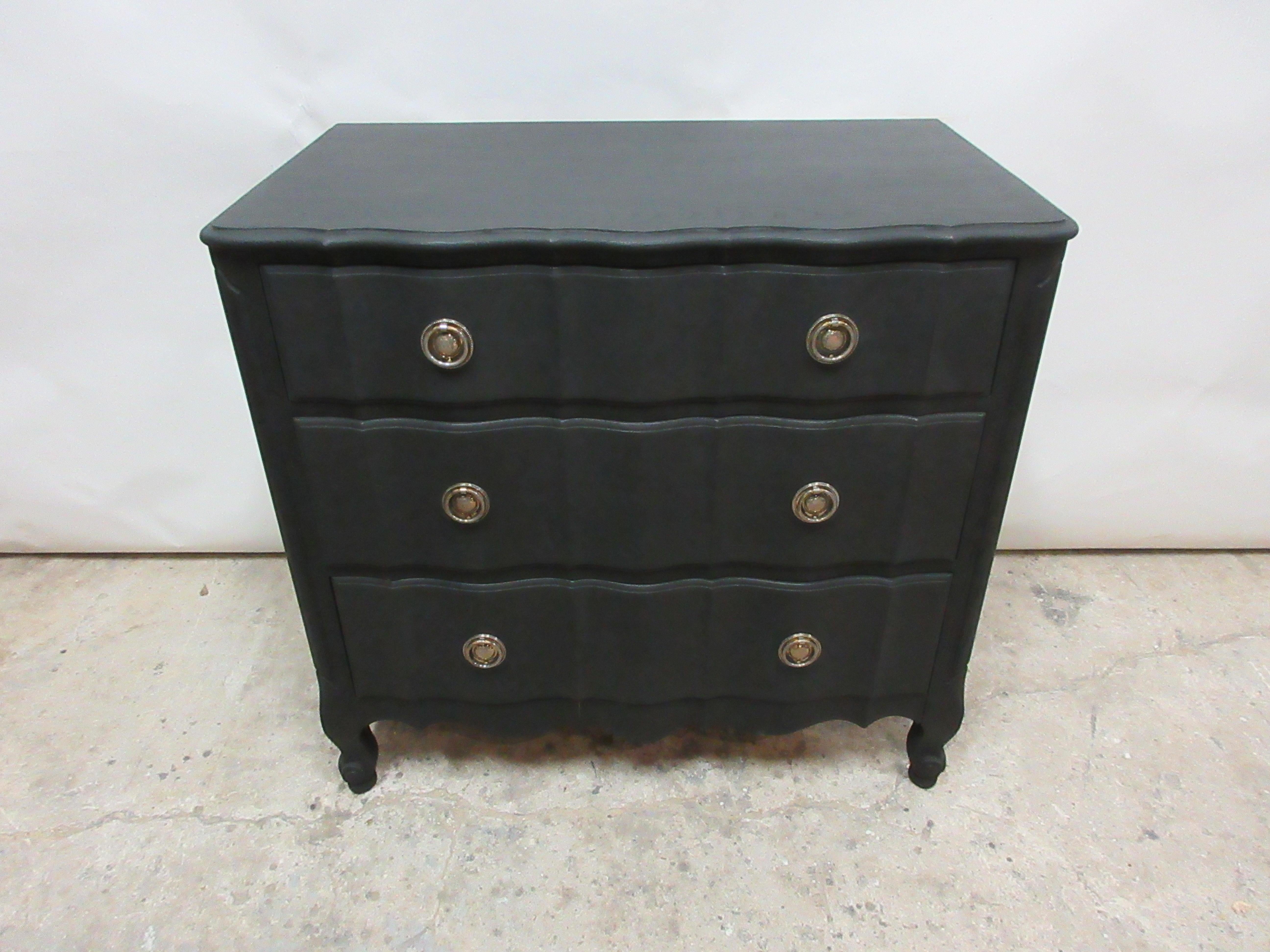 This is a midnight black Rococo chest of drawers, its been restored and repainted with milk paints 