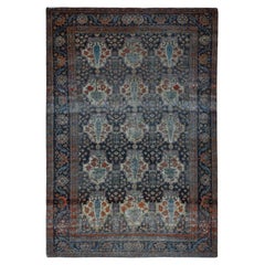 Tapis persan ancien Isphahan Garden Design en pure laine nouée à la main bleu nuit