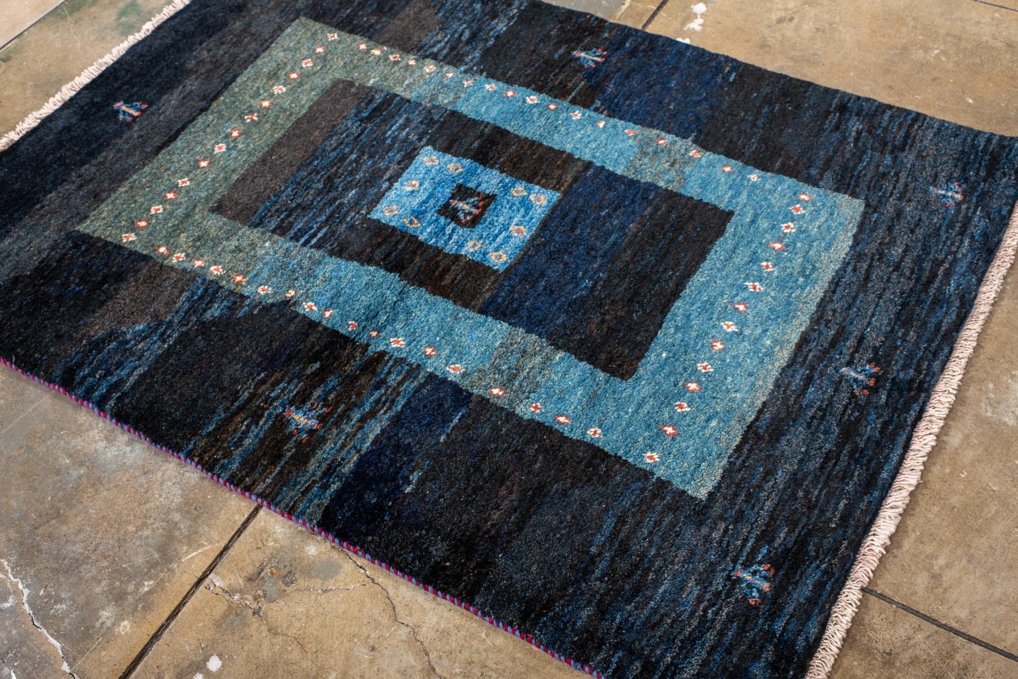 20th Century Midnight Blue Gabbeh Rug with Nested Borders and Tribal Figures For Sale