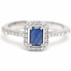 Midnight Elegance 18K White Gold Blue Sapphire Halo Ring