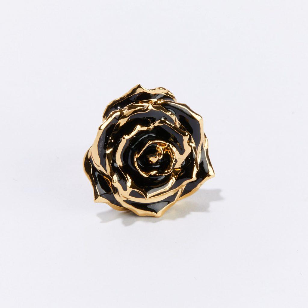 Enchanting and mysterious, our Midnight Promise Eternal Lapel Pin is the perfect gift for the one you desire. Dark and mysterious real rose petals are trimmed in gold and symbolize passion and undying love. Delicately handcrafted, our one-of-a-kind