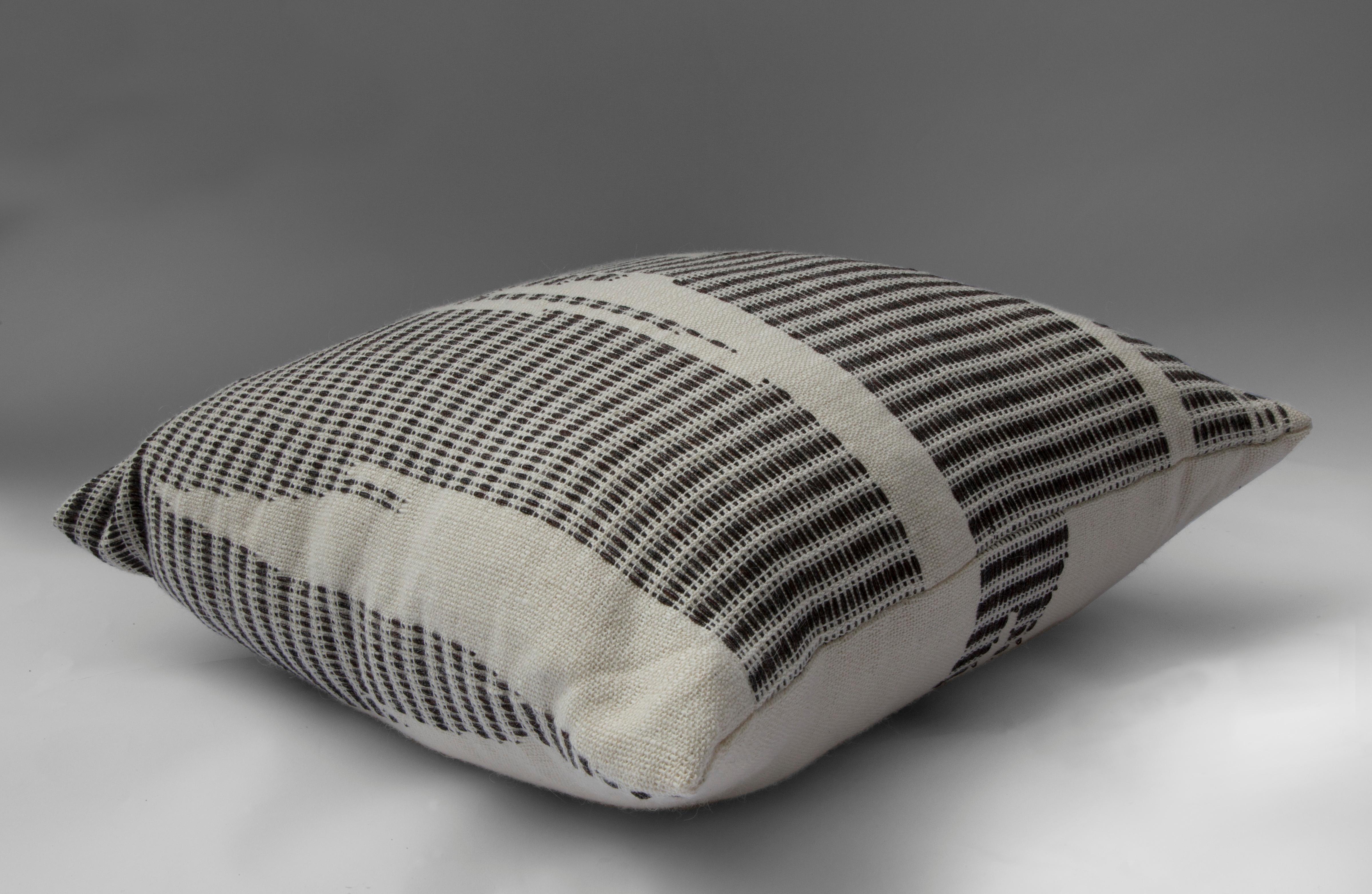 Luxurious pillow, handwoven with Icelandic sheep wool from small farm in Maine as Japanese silk and cotton. Down/feather insert with invisible zipper enclosure.