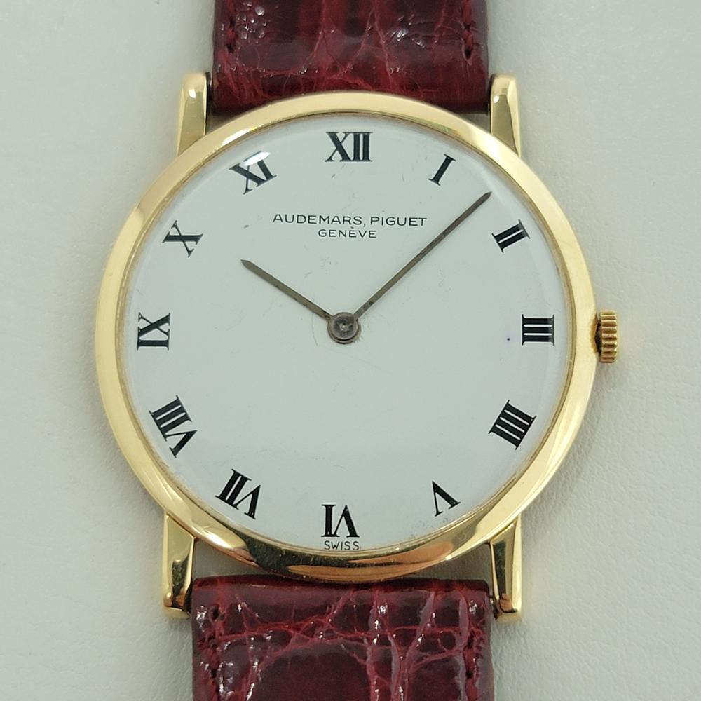 Timeless luxury, Men's midsize/unisex 18k solid gold Audemars Piguet classic dress watch, c.1950s, in excellent working condition. Verified authentic by a master watchmaker. Gorgeous, Audemars Piguet signed dial, Geneve hallmarked, Roman numeral