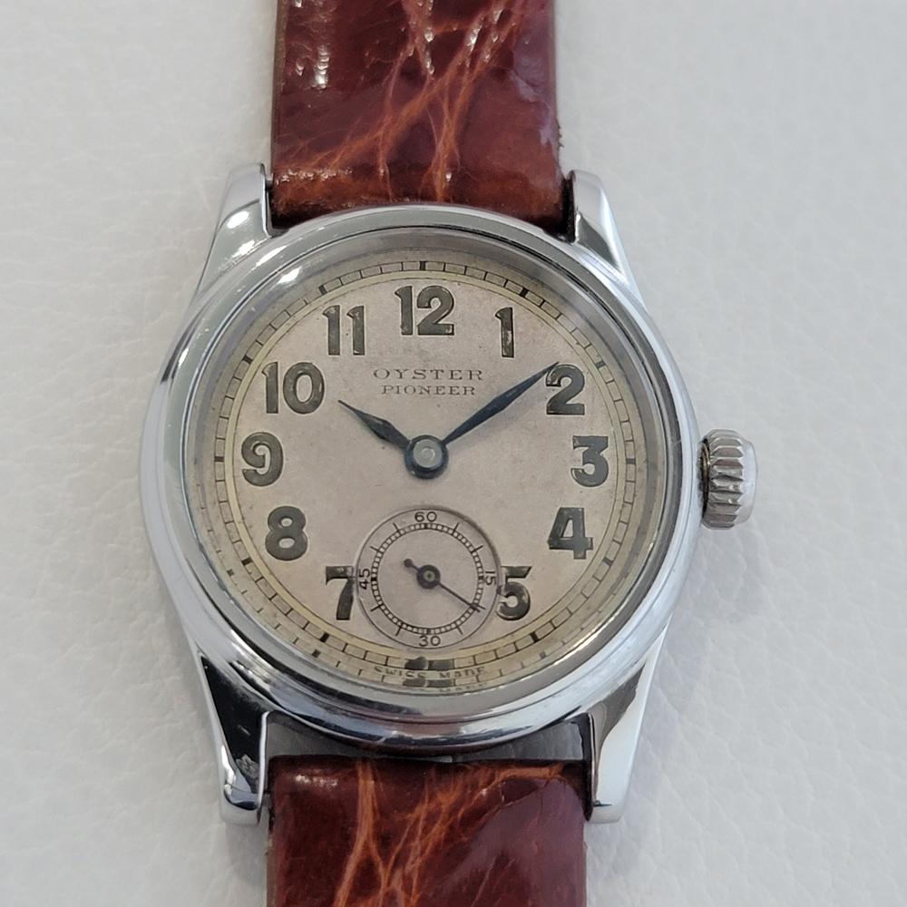 Rare collectable timepiece, midsize Men's Oyster Pioneer Ref.3373 hand-wind military style watch by Rolex, c.1930s. Verified authentic by a master watchmaker. Gorgeous, original vintage dial, some natural discoloration on dial, lozenge minute and