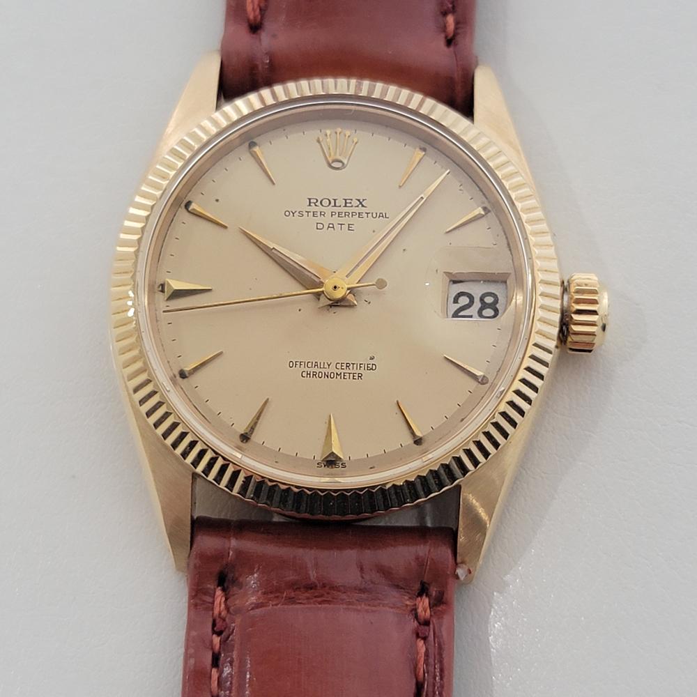 Timeless luxury, 18k solid gold Midsize Rolex Oyster Perpetual Date Ref.6627 automatic dress watch, c.1959, in excellent working condition. Verified authentic by a master watchmaker. Gorgeous Rolex signed gold dial, applied dagger index hour
