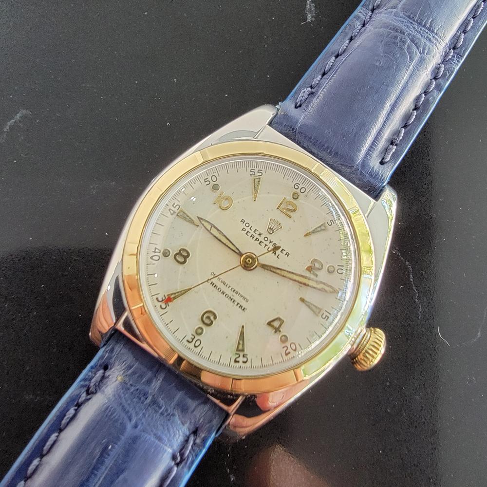 Timeless classic, Men's midsize Rolex 14k gold & ss Oyster Perpetual automatic bubble back dress watch, c.1948. Verified authentic by a master watchmaker. Gorgeous Rolex signed dial, applied alternating arrowhead and Arabic numeral hour markers,