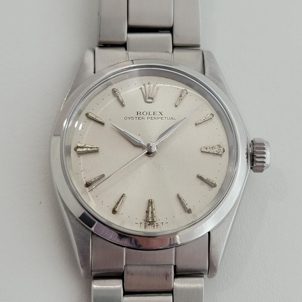 Timeless classic, Men's midsize Rolex ref.6548 Oyster Perpetual automatic dress watch, c.1966, all original. Verified authentic by a master watchmaker. Gorgeous Rolex signed silver dial, applied indice hour markers, minute and hour hands, sweeping
