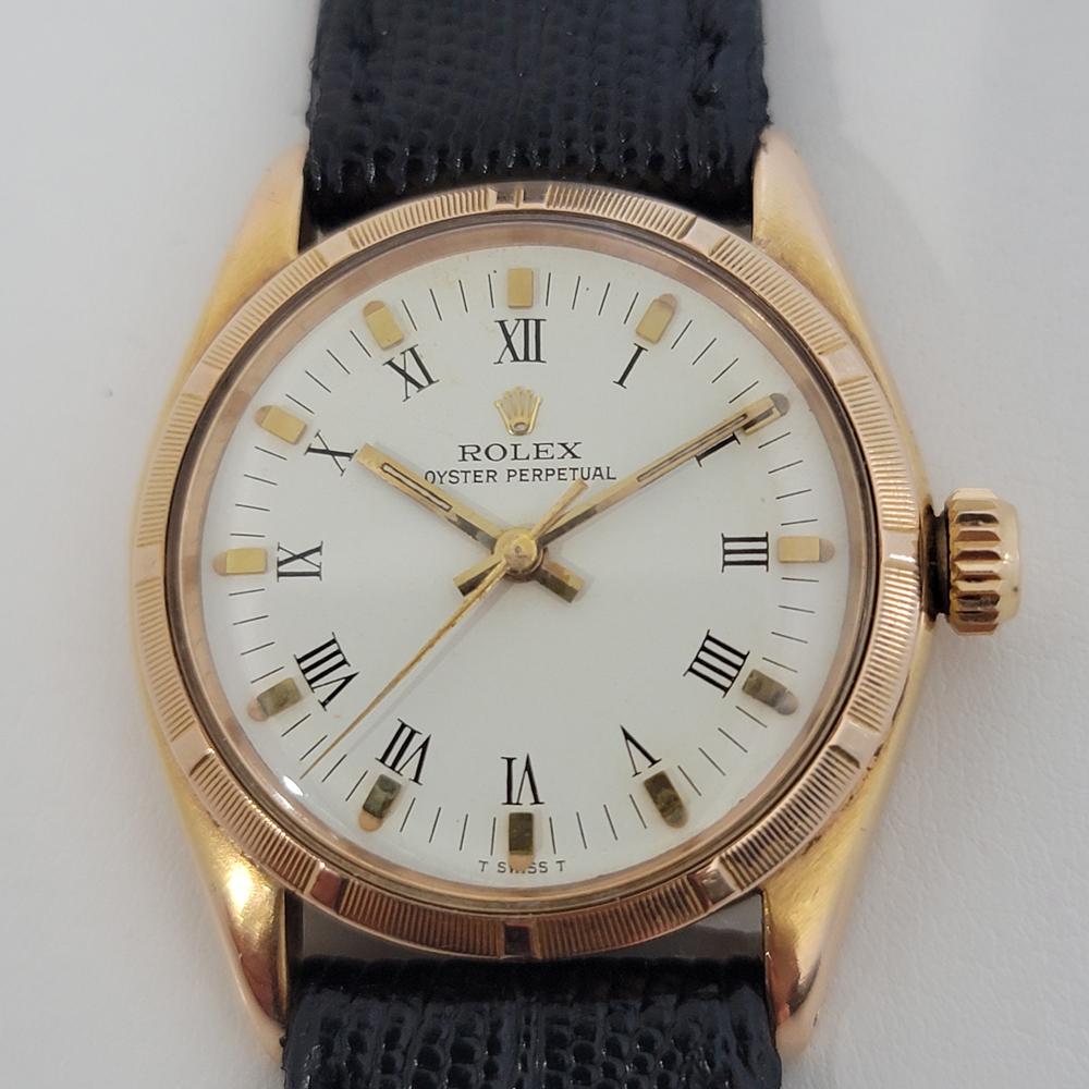 Luxurious classic, Men's midsize 18k rose gold Rolex ref.6549 Oyster Perpetual automatic dress watch, c.1957. Verified authentic by a master watchmaker. Gorgeous Rolex signed dial, applied indice and printed Roman numeral hour markers, gilt minute
