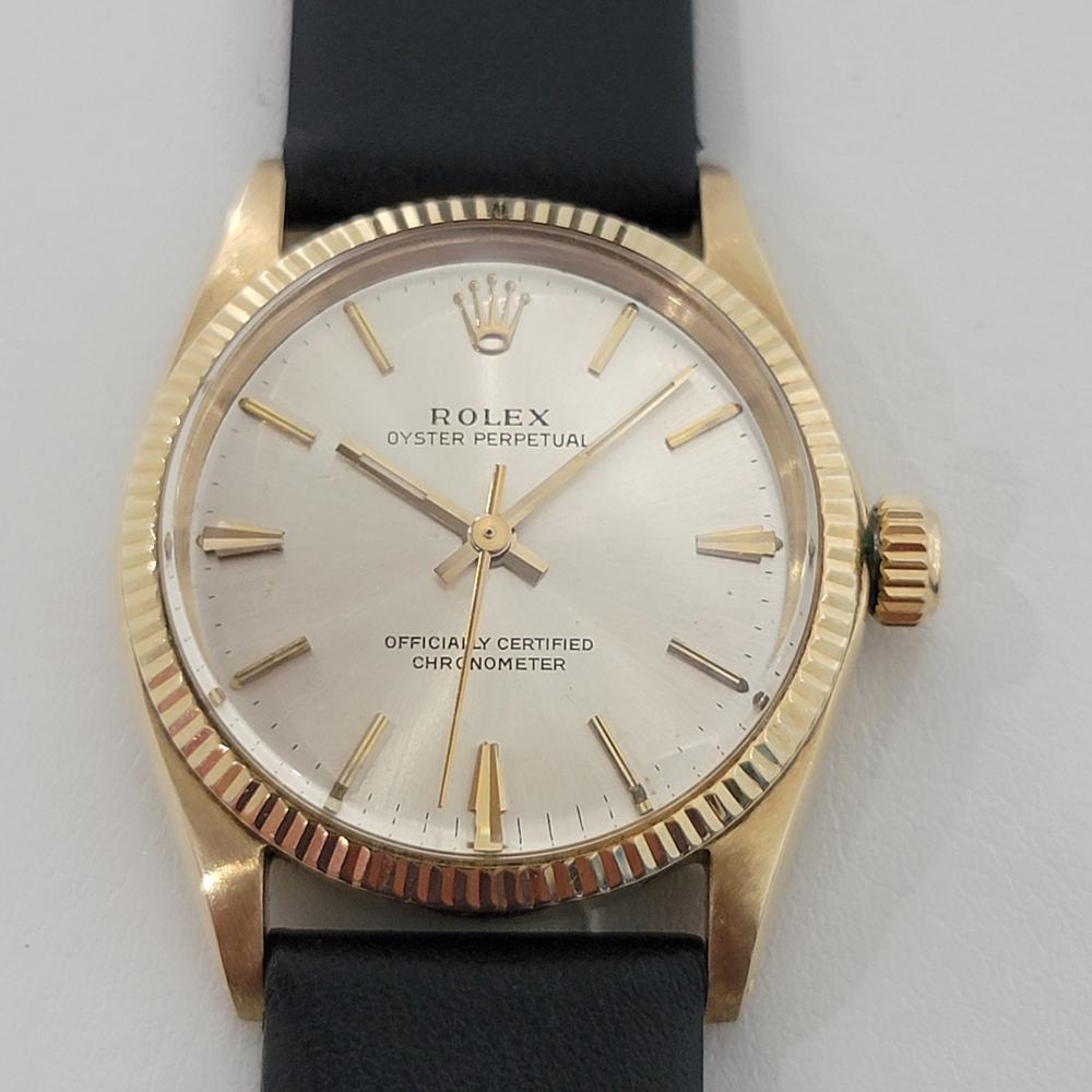Luxurious classic, Men's midsize solid 14k gold Rolex ref.6551 Oyster Perpetual automatic dress watch, c.1966. Verified authentic by a master watchmaker. Gorgeous Rolex signed dial, applied indice markers, gilt minute and hour hands, sweeping
