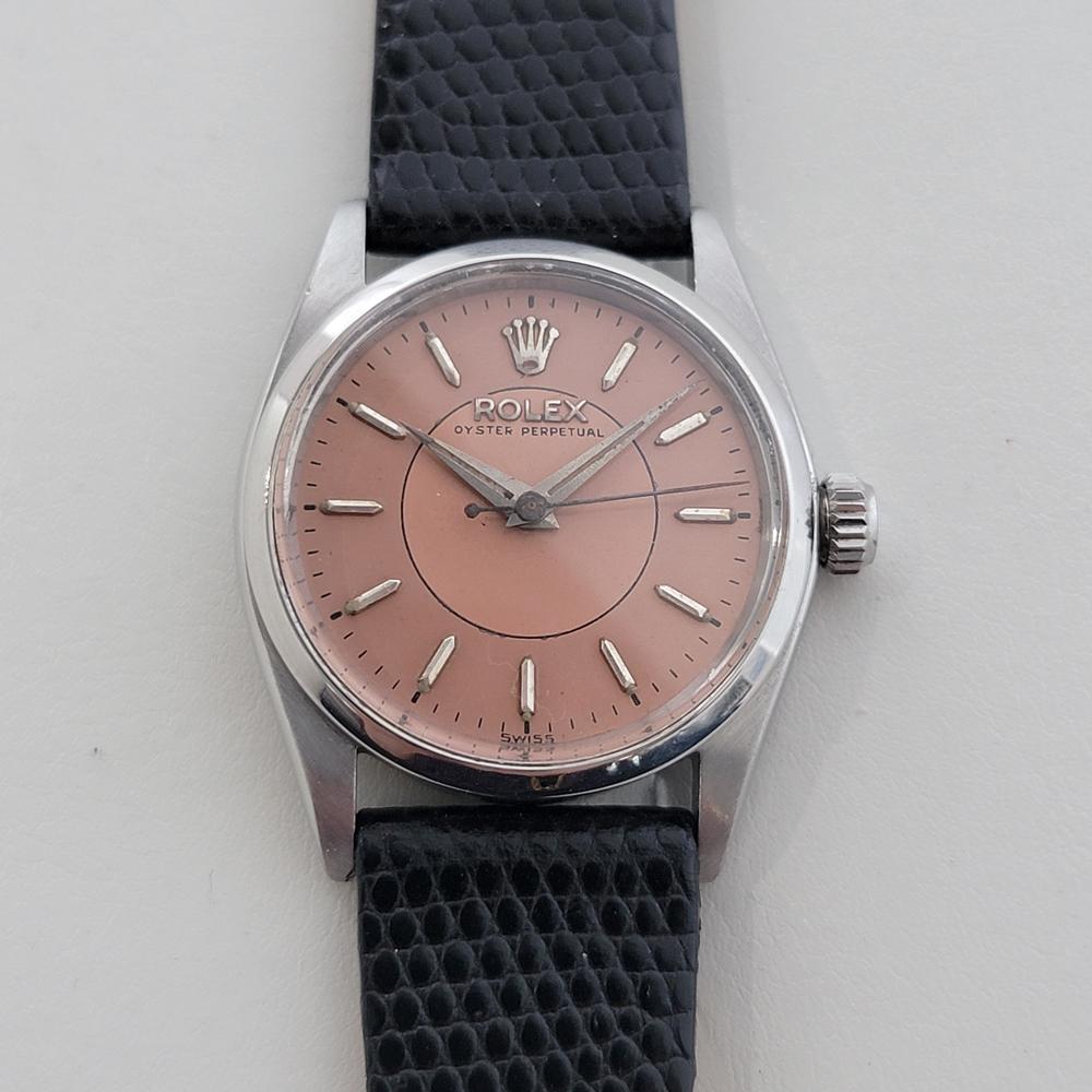 Charming vintage classic, Rolex midsize Oyster Perpetual ref.6548 automatic, c.1958, in excellent working condition. Verified authentic by a master watchmaker. Gorgeous, Rolex signed dial, applied silver index hour markers, silver minute and hour