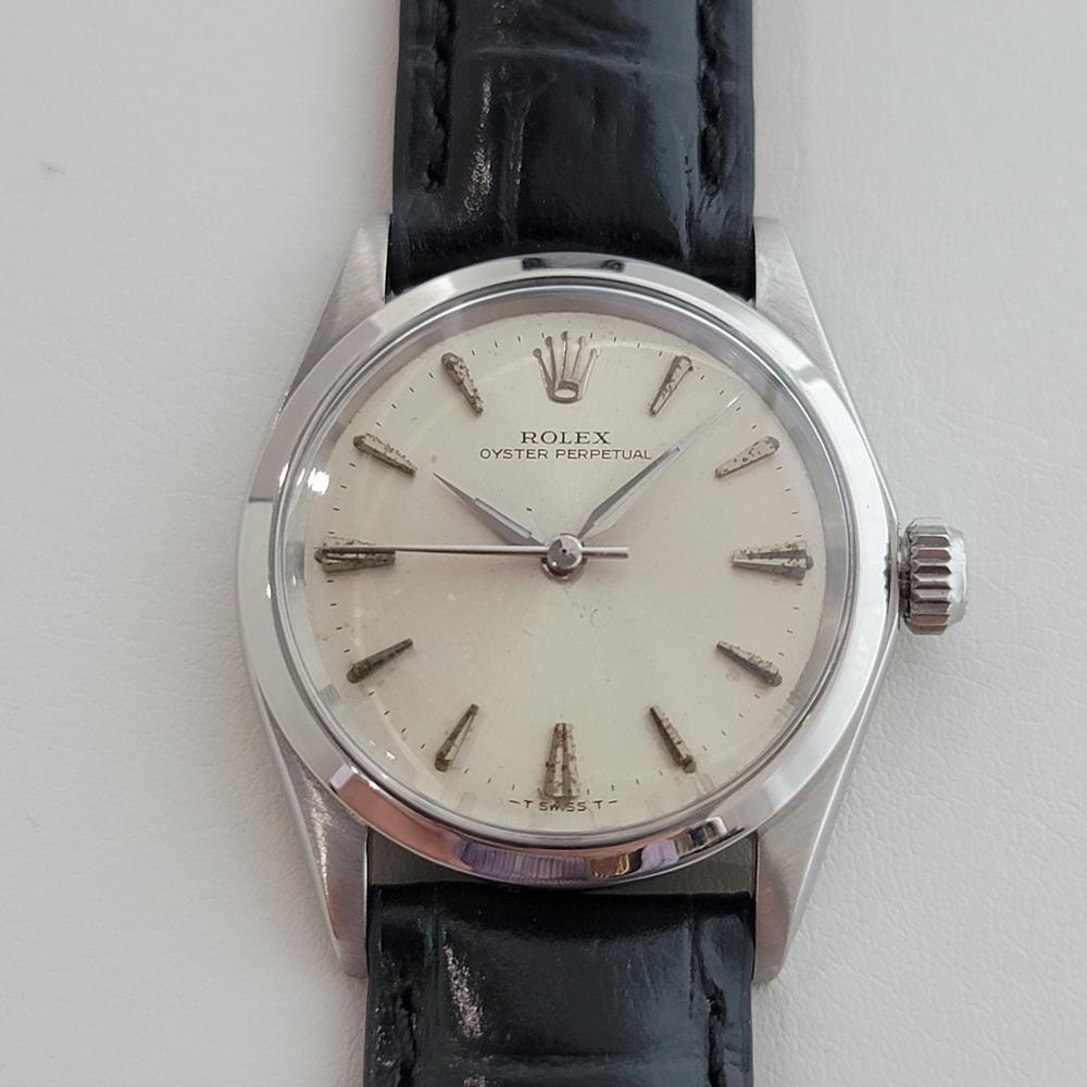 Iconic vintage classic, Men's midsize Rolex ref.6548 Oyster Perpetual automatic dress watch, c.1966. Verified authentic by a master watchmaker. Gorgeous Rolex signed silver dial, applied indice hour markers, minute and hour hands, sweeping central