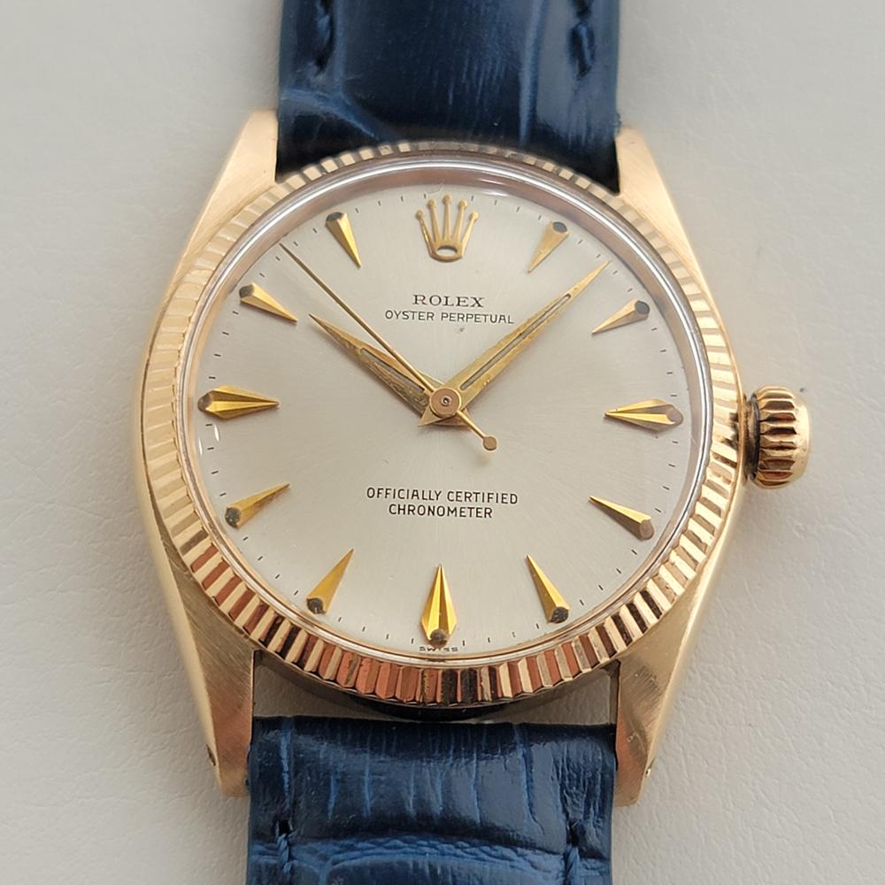 Timeless luxury, 18k solid gold Midsize Rolex Oyster Perpetual Ref.6551 automatic dress watch, c.1958, in excellent working condition. Verified authentic by a master watchmaker. Gorgeous Rolex signed dial, applied dagger index hour markers, gilt