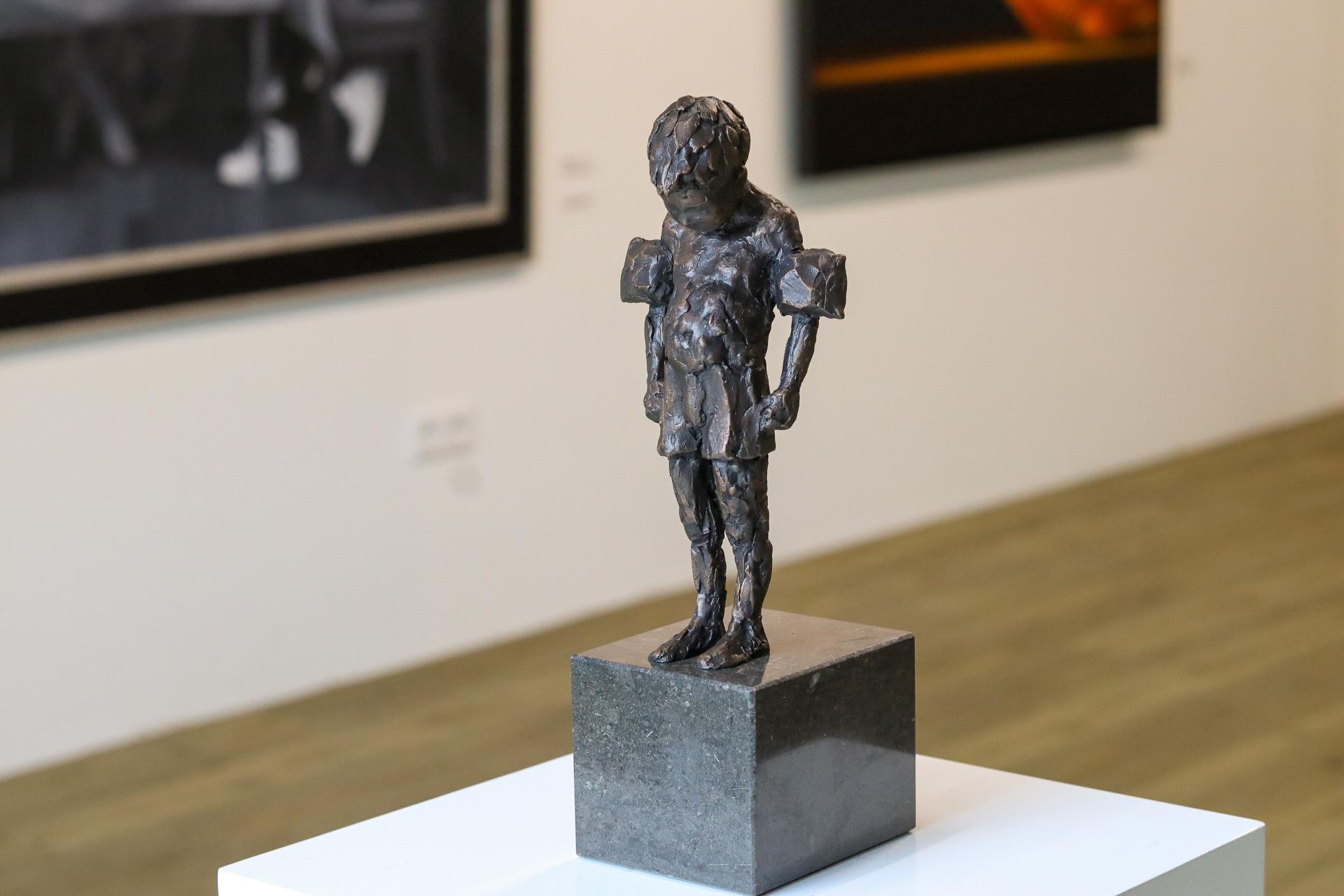 Mieke Heitling Figurative Sculpture - Swimming Lessons - 21st Century Contemporary Bronze Sculpture of a Little Boy