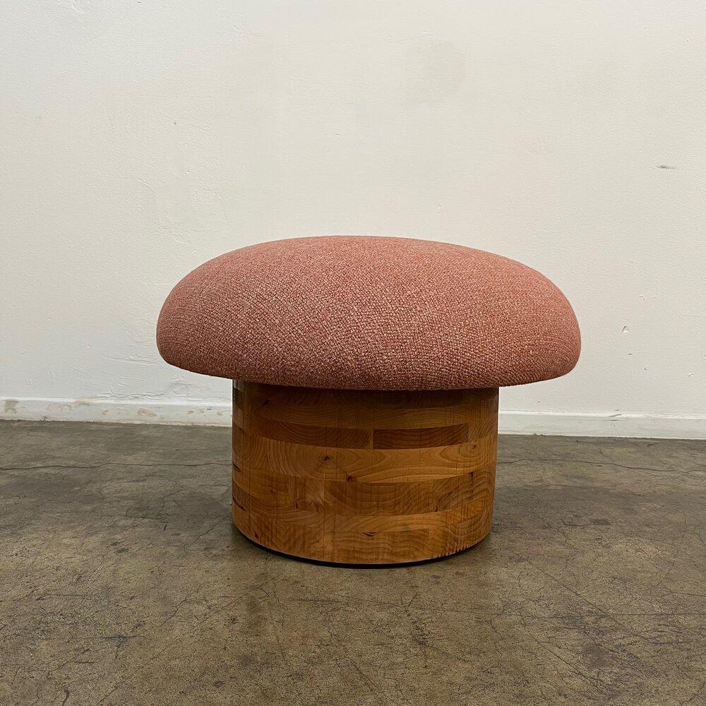 Measures: W25 D25 H18.

Handcrafted in house our new Miel Mushroom features a heavy solid honey colored wood base. Item is custom made to your specifications, fabric and dimensions can all be changed.