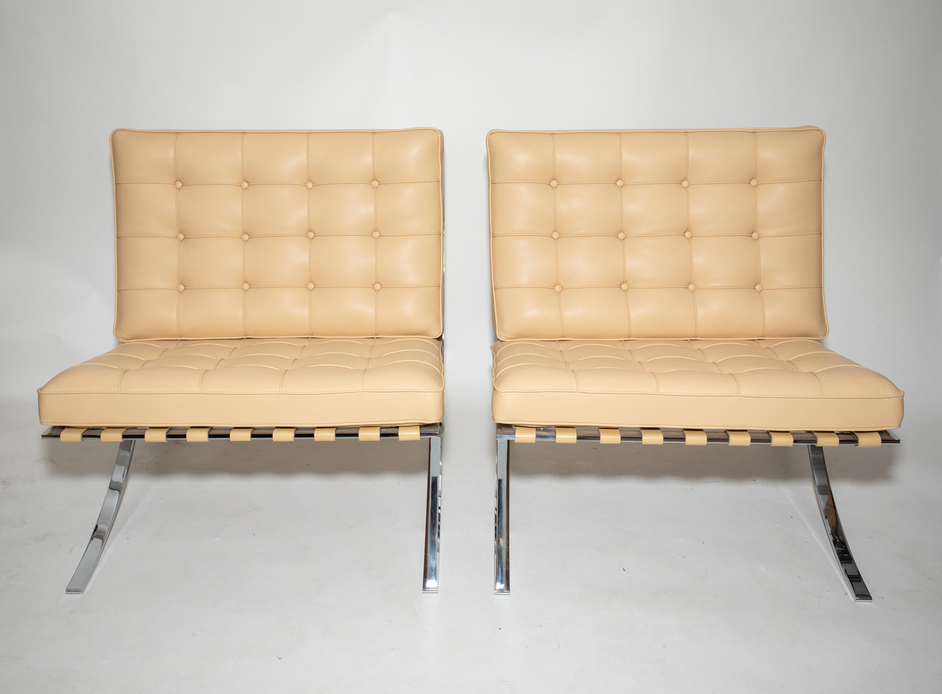 Pair of Ludwig Mies Van Der Rohe Barcelona chairs
Manufactured by Knoll in the 1990s
Beautiful leather, very clean 
Knoll label and engraved signature on frame
Made in United States.