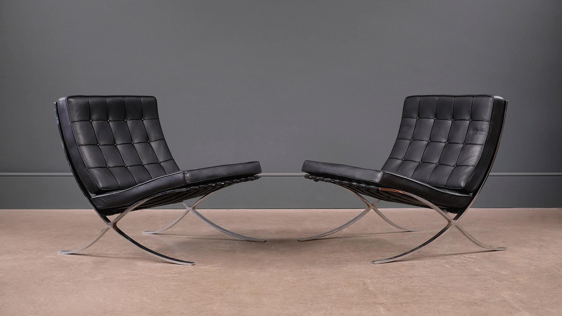 Wonderful pair of vintage Barcelona chairs designed by Mies Van Der Rohe and made by Knoll International. Great light patina and superb quality.