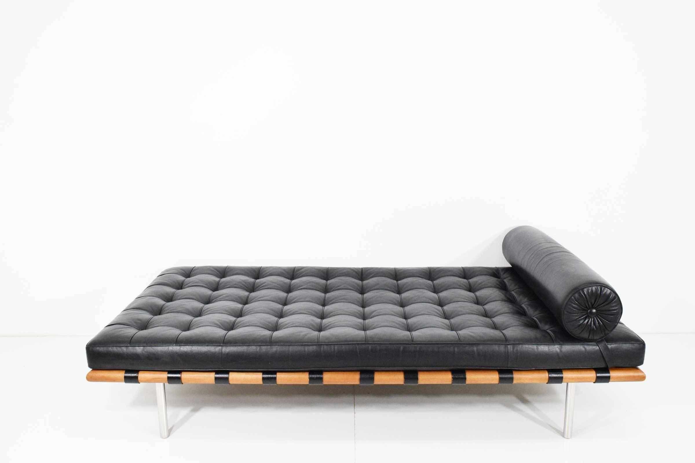 Early Mies van der Rohe Barcelona daybed in black leather. The Barcelona daybed/couch was designed by Mies van der Rohe in 1930. Knoll acquired the rights to the Barcelona collection in 1948. In 1959 art metal acquired Knoll from Florence Knoll. In