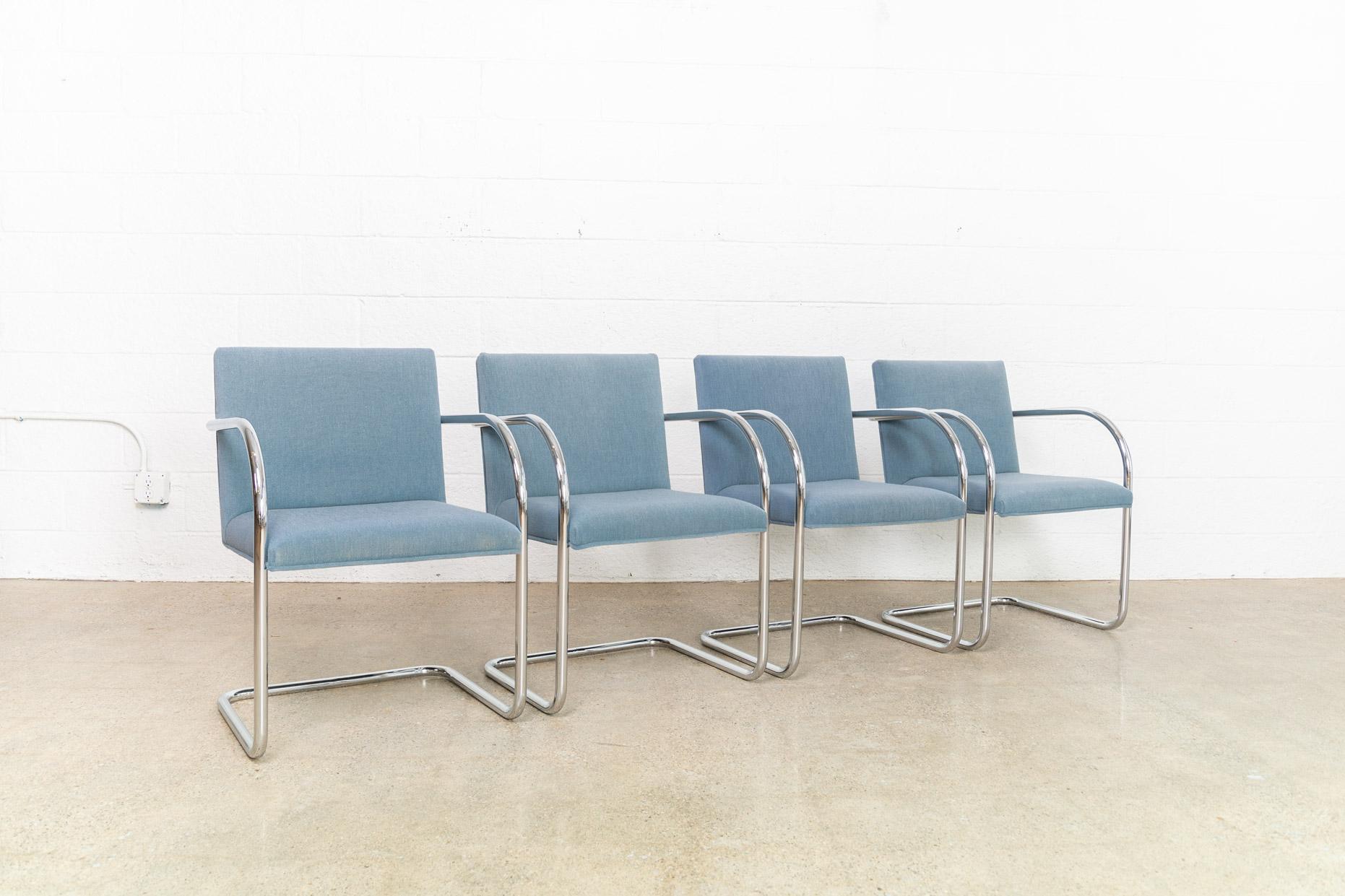 This set of four Mies van der Rohe Brno armchairs made by Gordon International are circa 1990. These iconic Mid-Century Modern chairs designed by Mies van der Rohe in 1930 feature clean lines and a simple profile. Model 504 features a cantilever