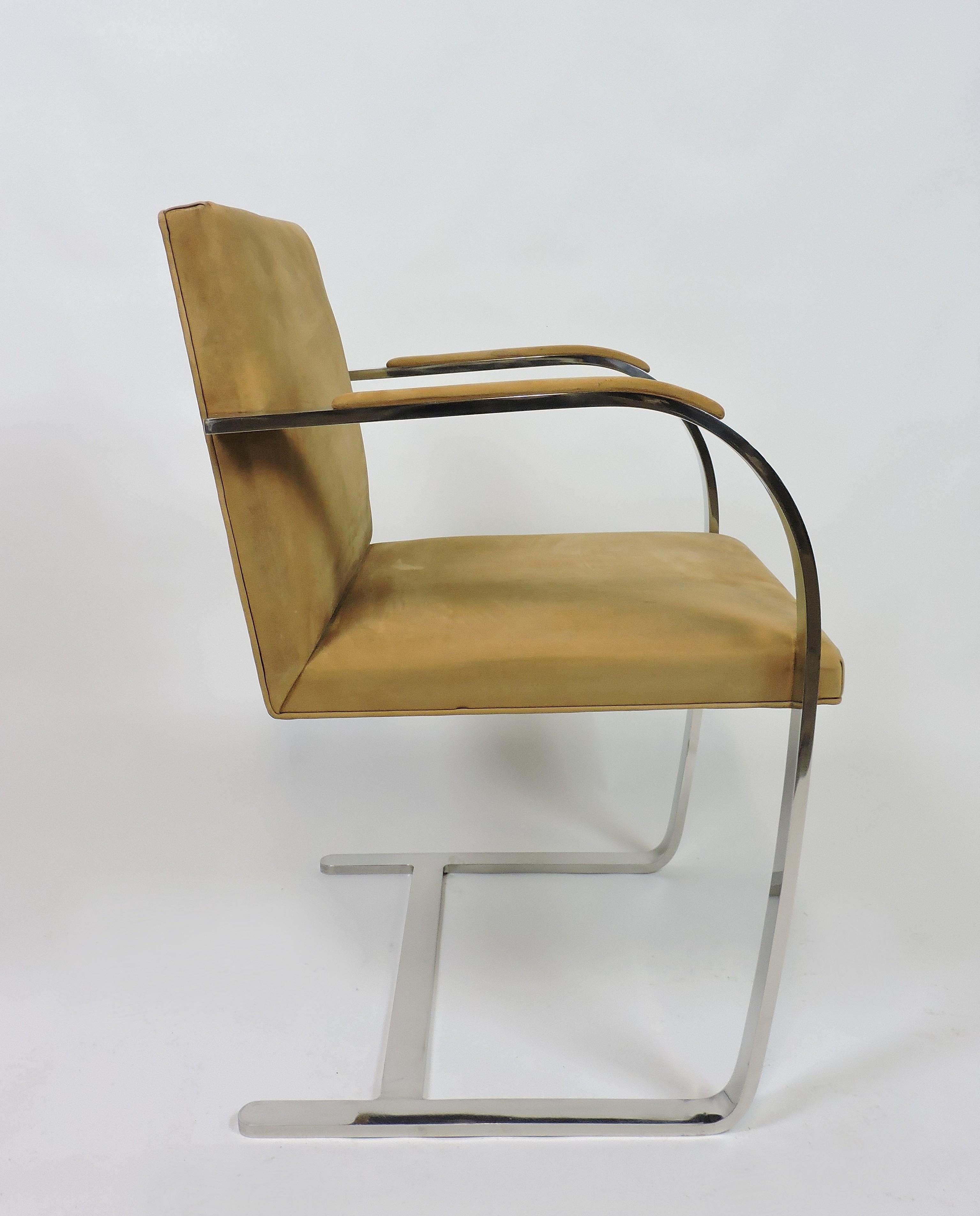 Classic Brno chair designed by Ludwig Mies van der Rohe in 1930 and manufactured in 1977 by Knoll. Simple and elegant cantilevered design that will never go out of style. This chair frame is made of the more expensive solid polished stainless steel,
