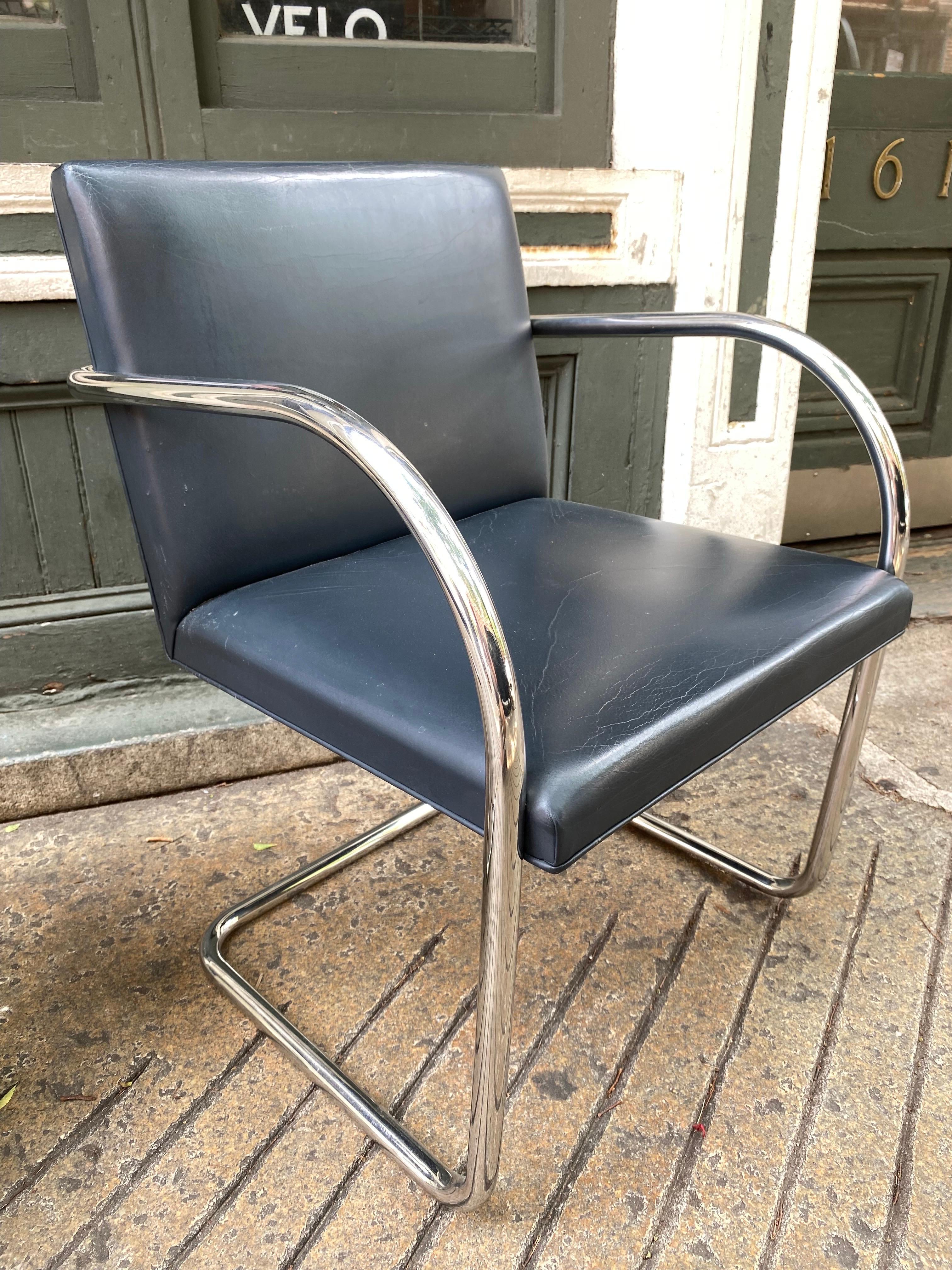 Mies van der Rohe Tubular Brno Chair, 2 available, priced separately. Chrome is super clean, leather shows wear and tear. Chairs are from the 1980's with Knoll labels. Use as is or redo in your choice of material! Classic Design that fits into so