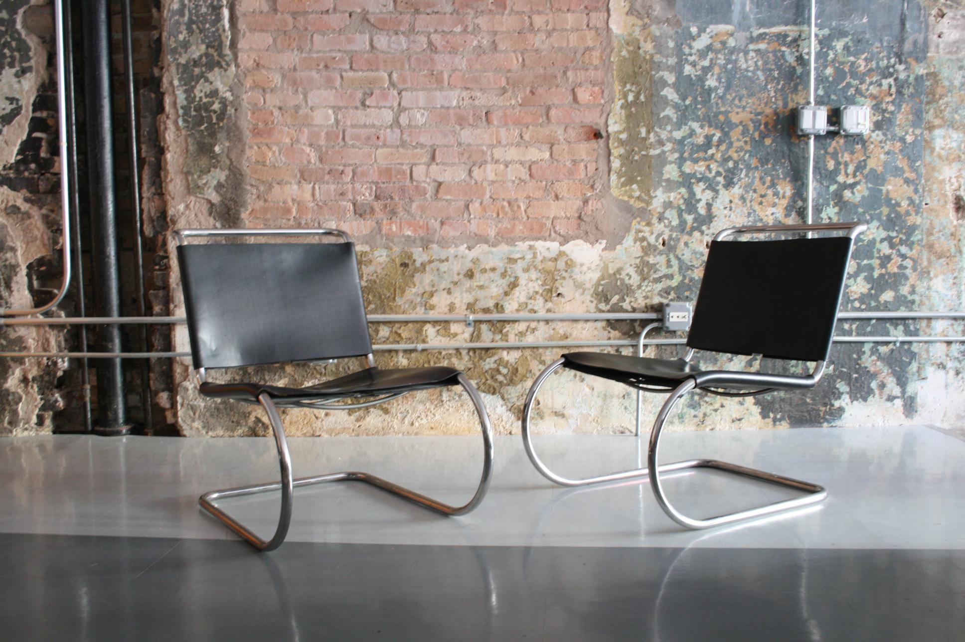 Mies van der Rohe cantilever leather model MR 30/5 lounge chairs for Knoll in original black belt leather and in excellent condition. Both chairs retain original Knoll labels. Very comfortable and both chairs look amazing without issues.