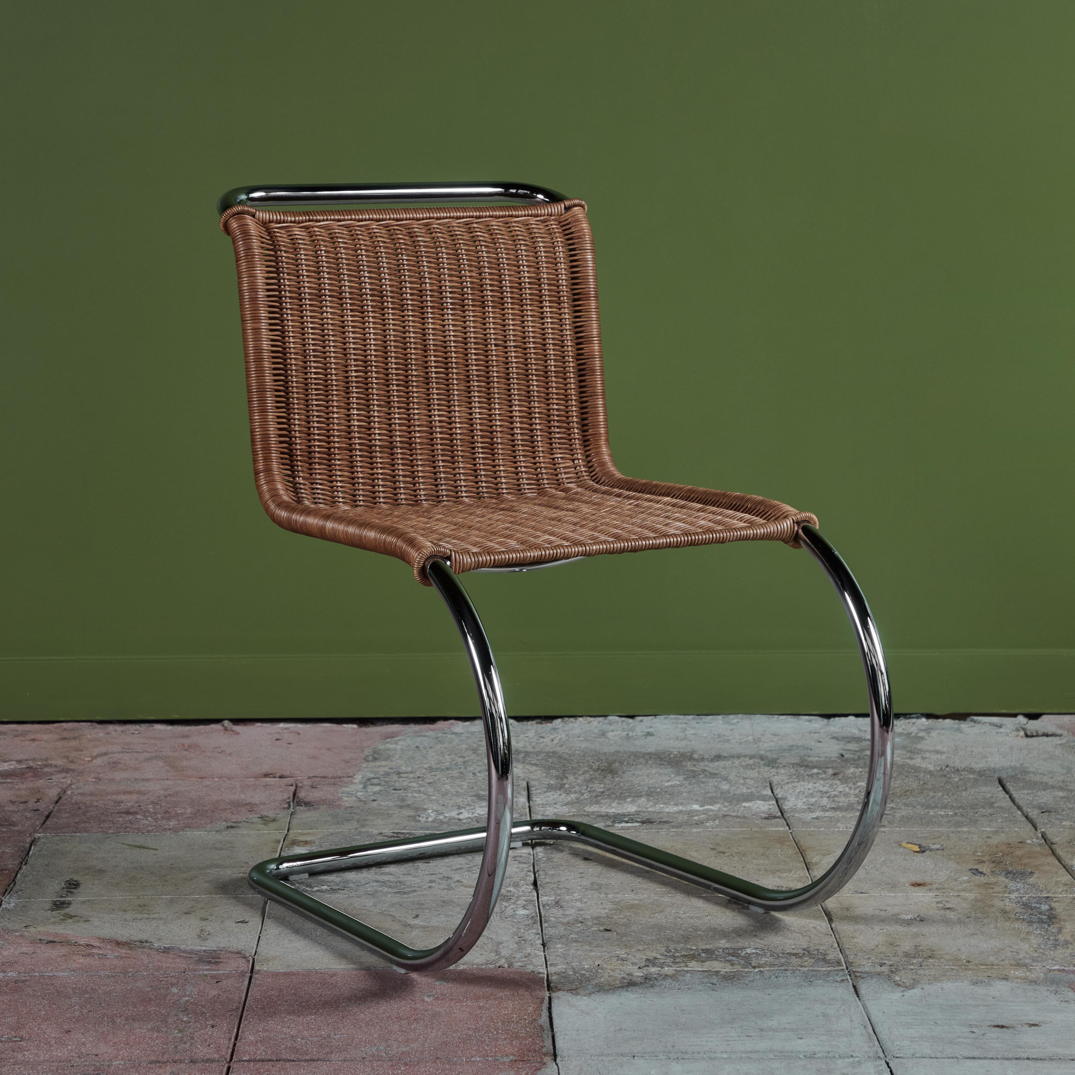 Cantilevered dining chair by Mies van der Rohe for Knoll, c.2015. The chair features a tubular chrome plated steel frame with handwoven cane seat and backrest. 
Retains their original Knoll International label.
 
Dimensions 
19