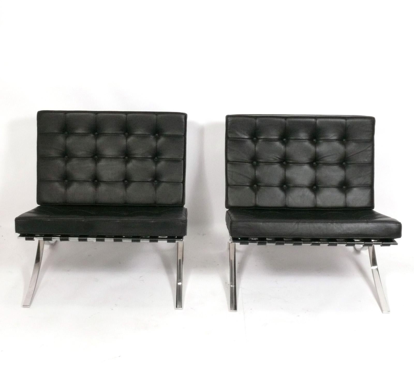 Iconic Barcelona Lounge Chairs, designed by Ludwig Mies van der Rohe for Knoll, American, circa 1979. Signed with Knoll labels underneath. The leather retains it's warm original patina. The leather has been cleaned and conditioned. They are priced