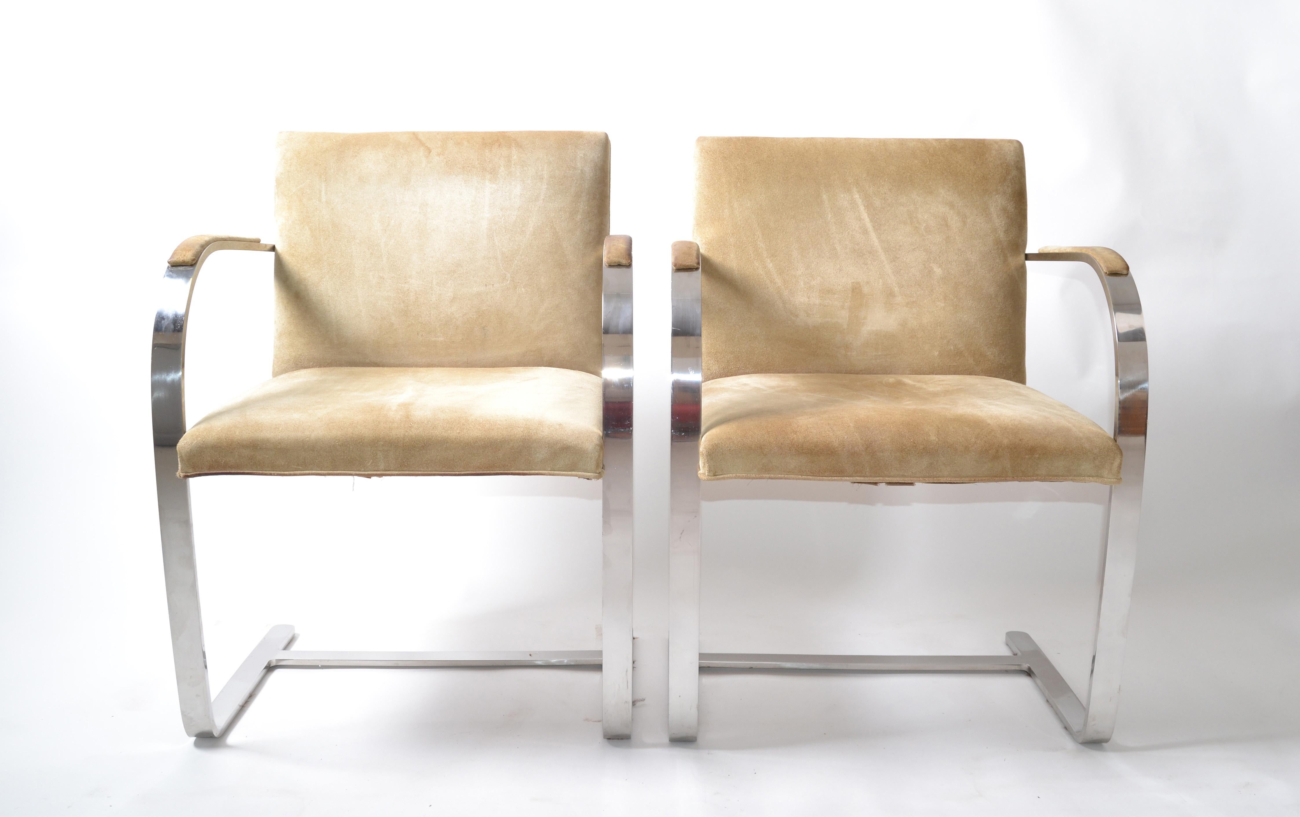 Pair of Mid-Century Modern Mies van der Rohe flatbar Brno for Knoll in stainless steel with the original Ultrasuede Upholstery and Arm pads. 
In good condition, no label but providence from Owner that the Chairs were purchased 1979. 
I also have a