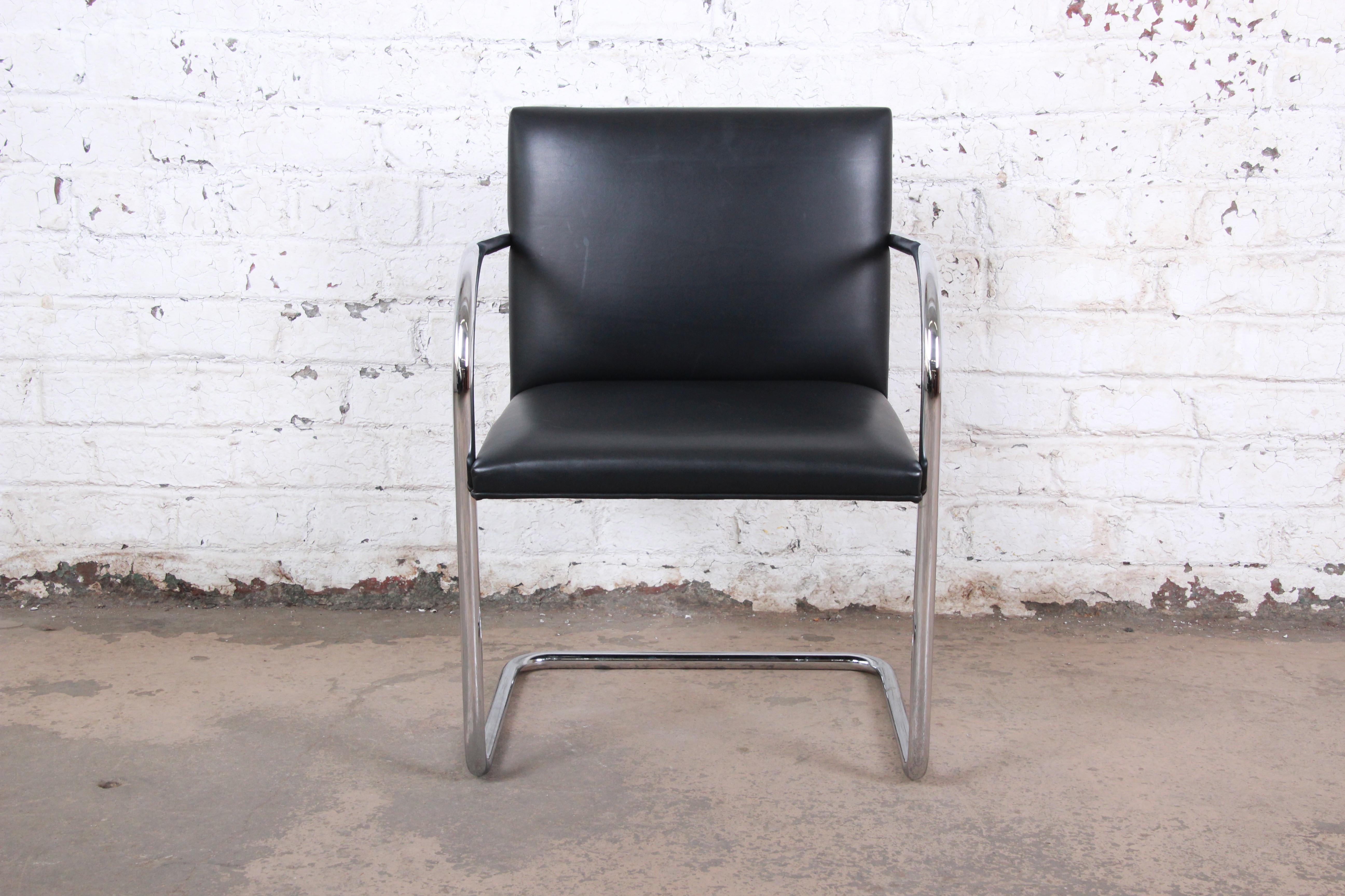 An exceptional Brno tubular chair in black leather. Designed by Ludwig Mies van der Rohe in 1930 for the Tugendhat House. Chrome-plated steel frame. The chair is signed and in very good original vintage condition.

Price is per chair. We currently
